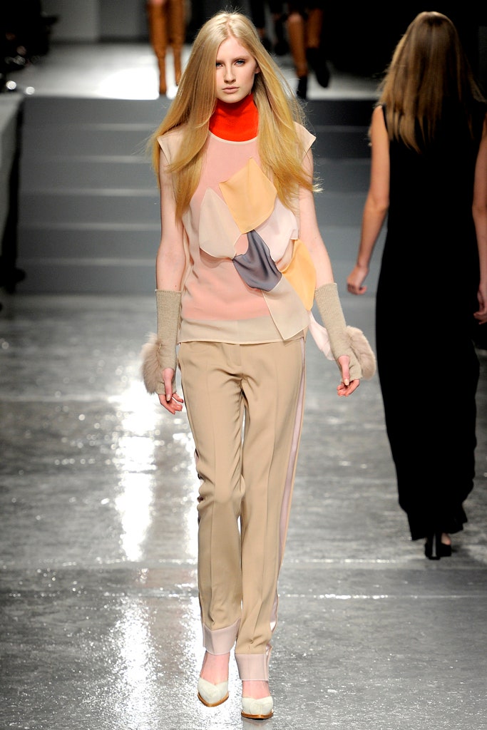 fitted layered silk top with tailored pants