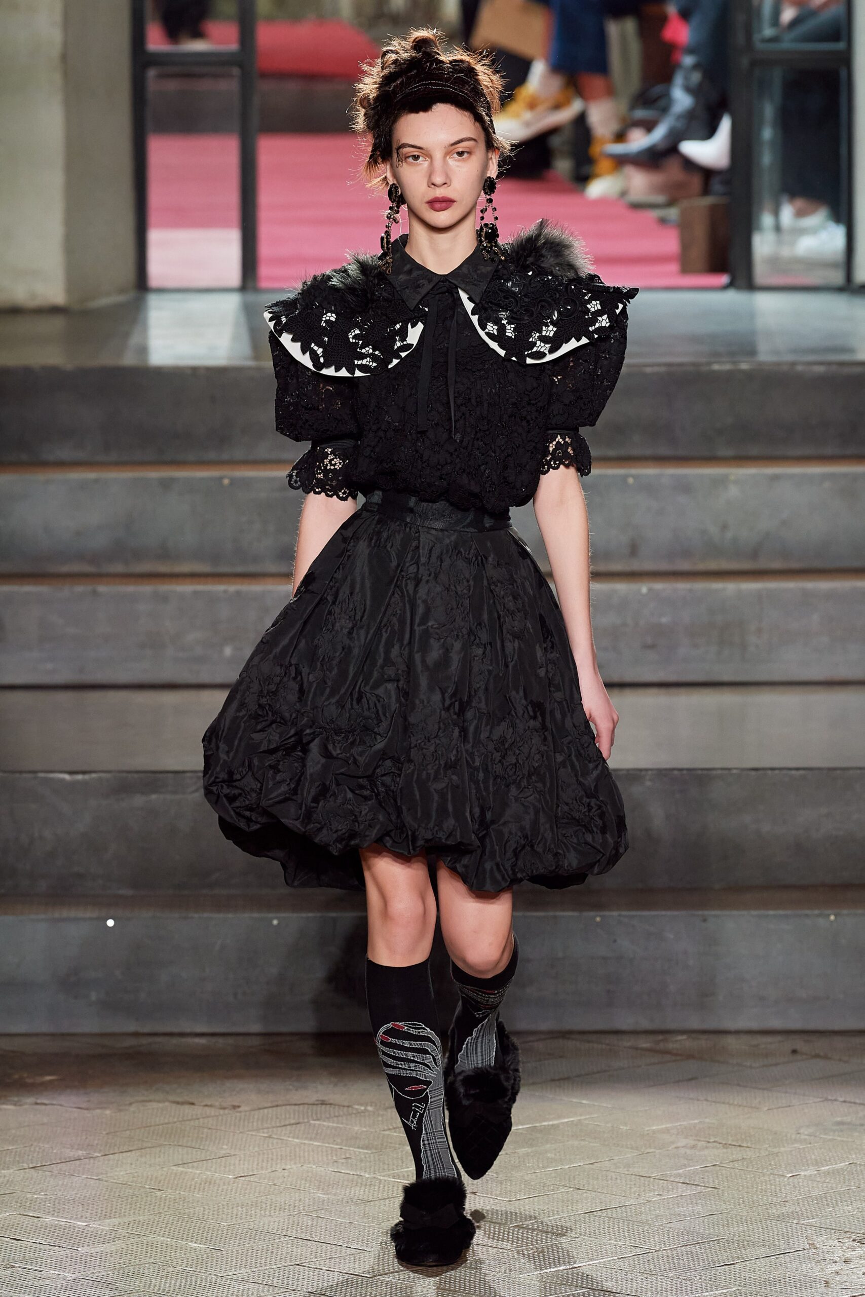 black mini dress with lace cape