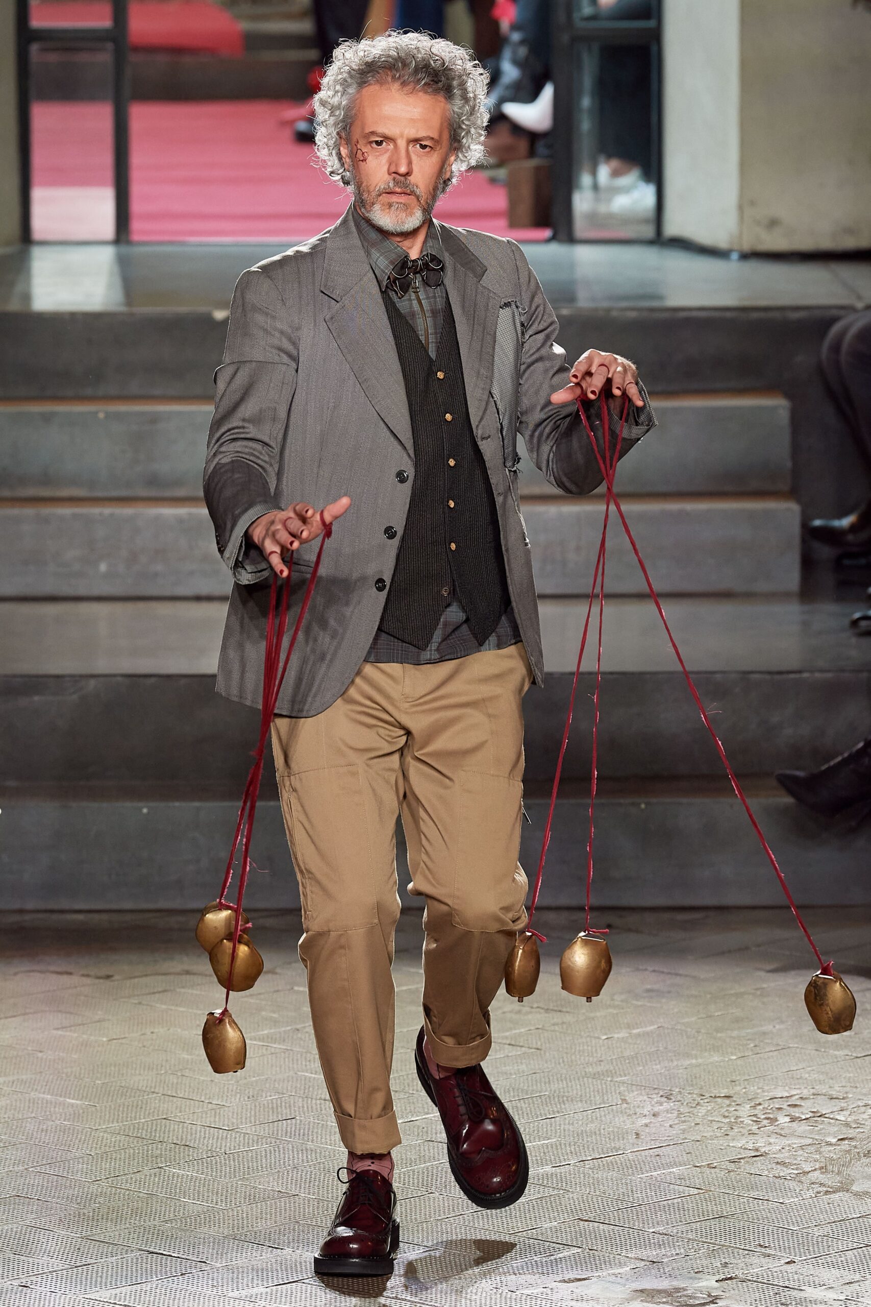 gray tailored suit with beige pants