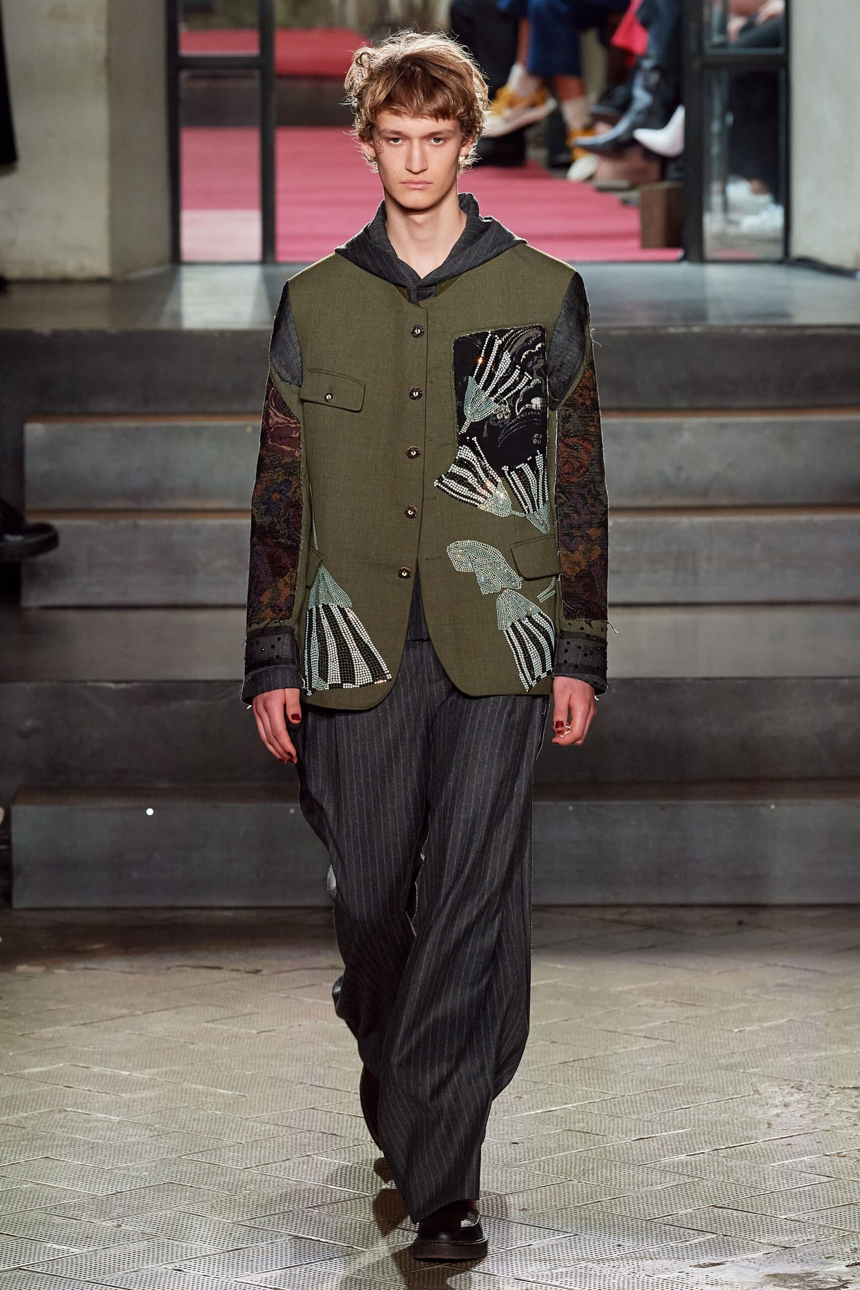 relaxed green embroidered jacket with black pants