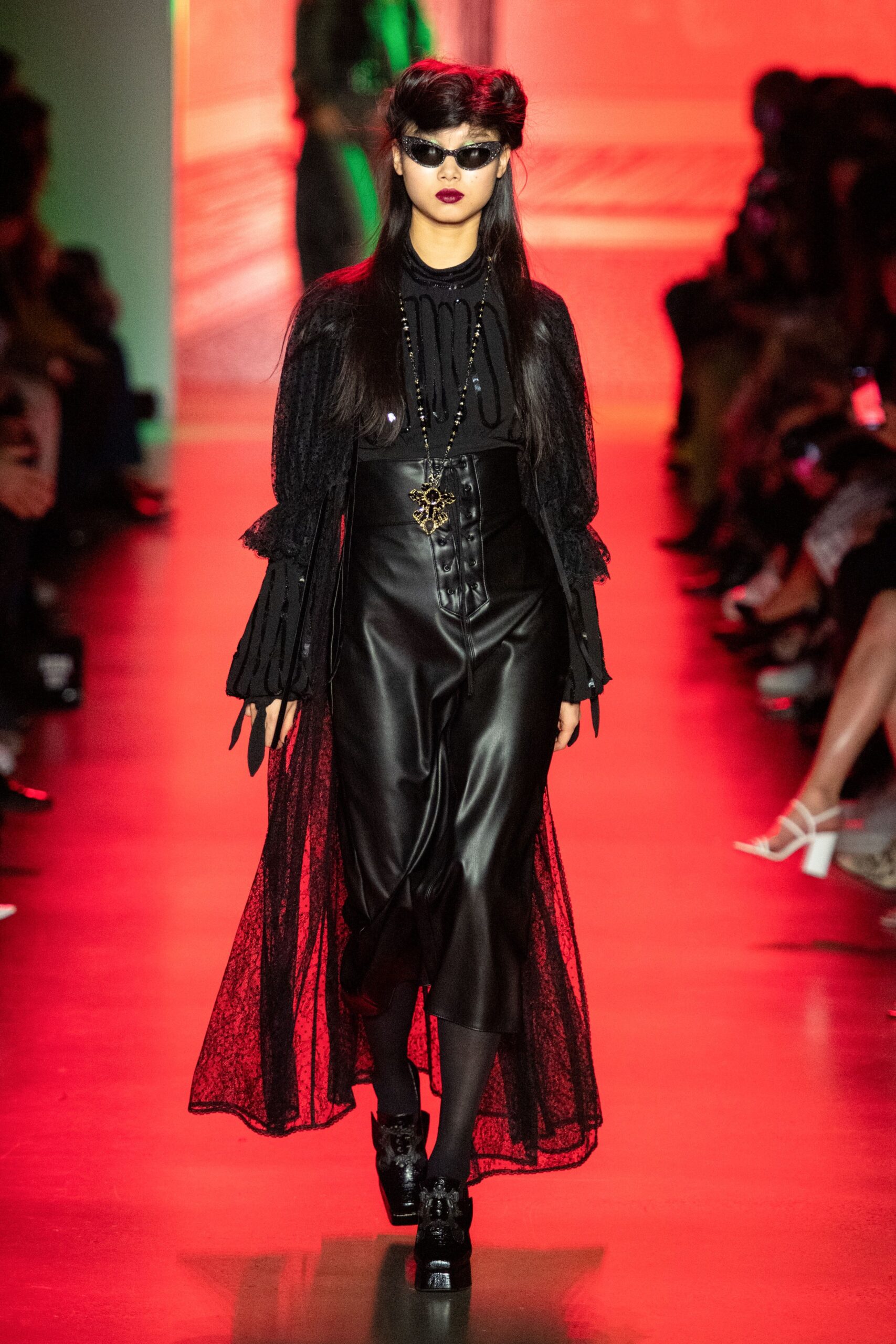 black leather fitted dress with lace cape