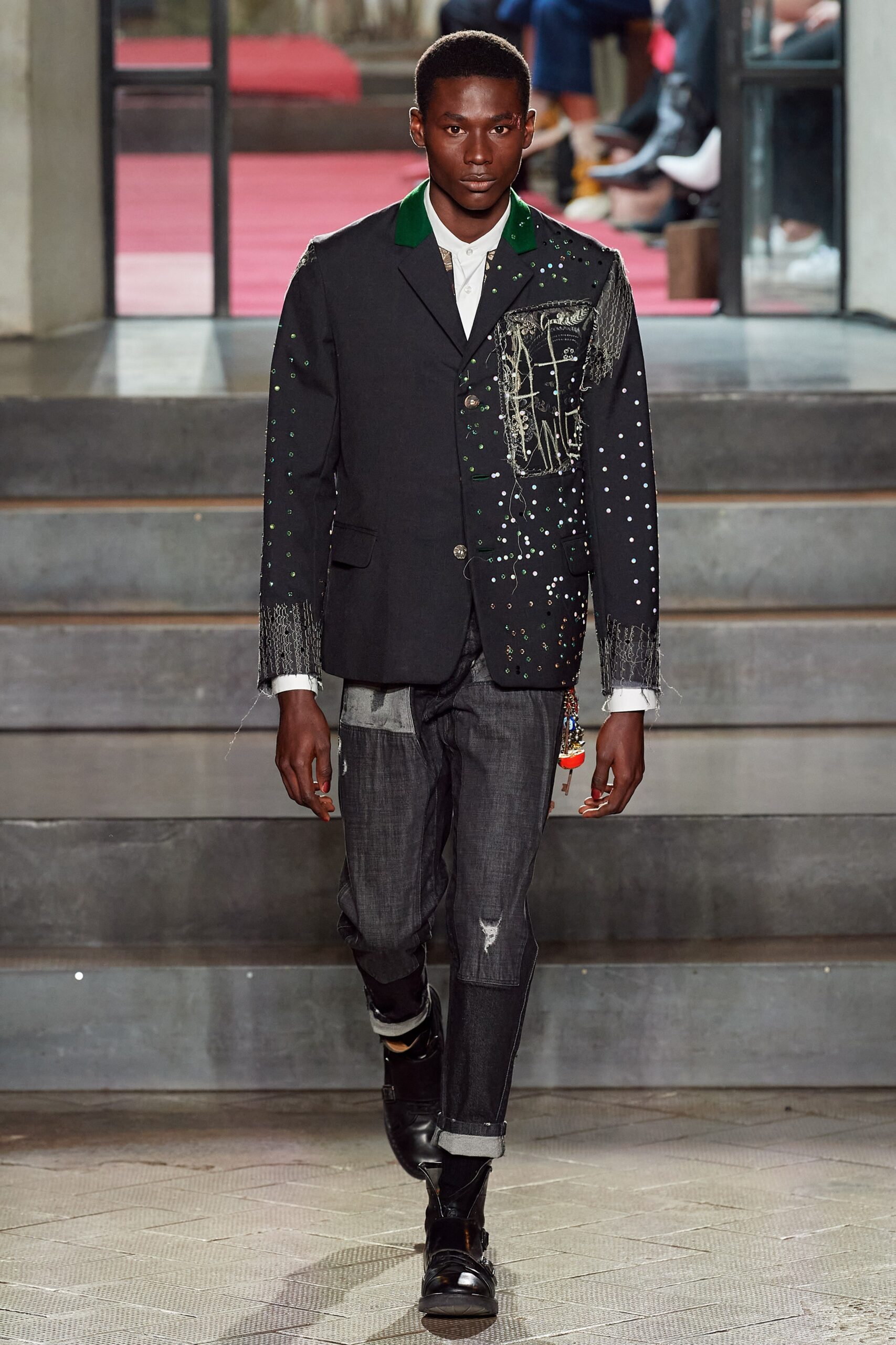 black tailored blazer with gray pants