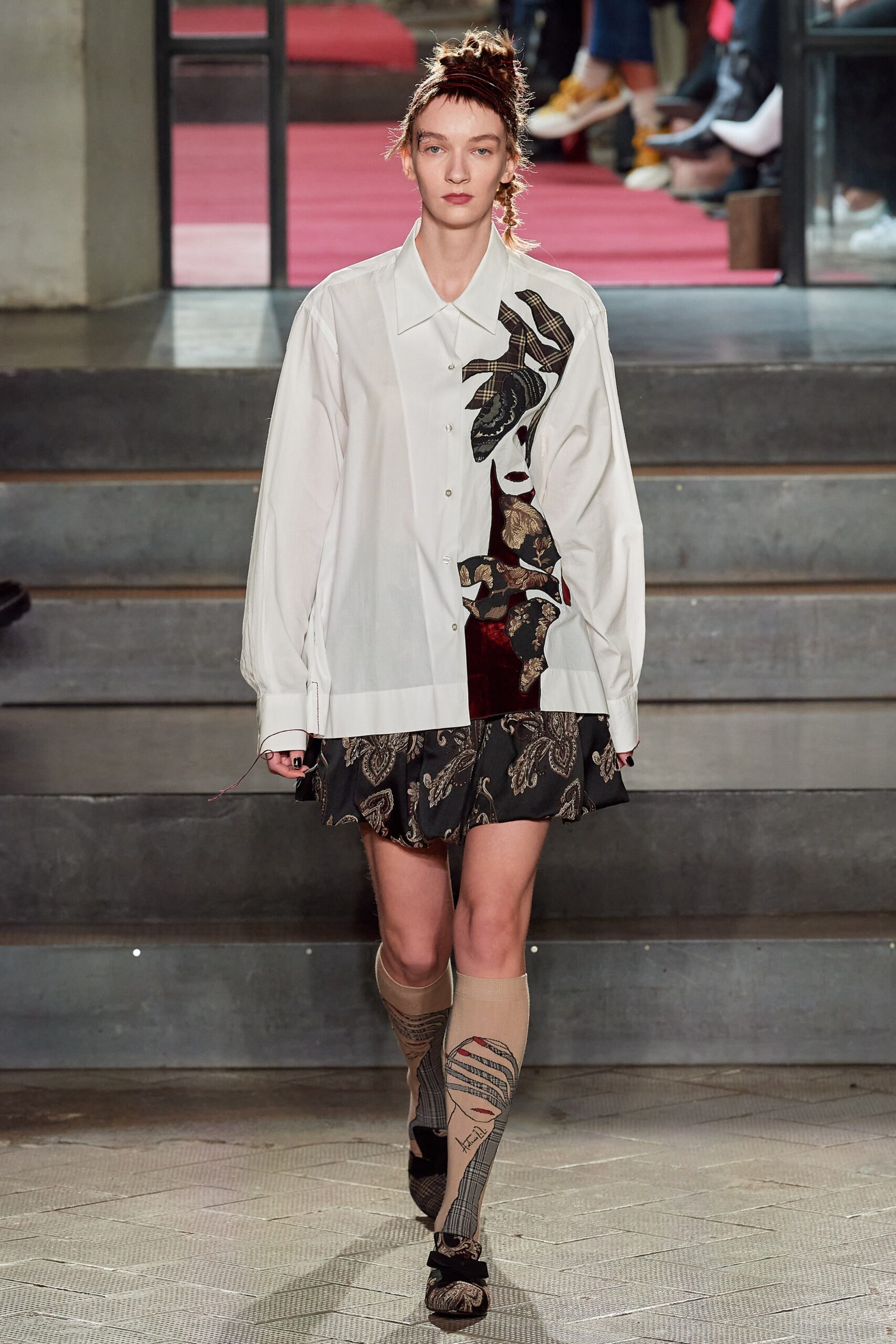white relaxed shirt with black flared skirt