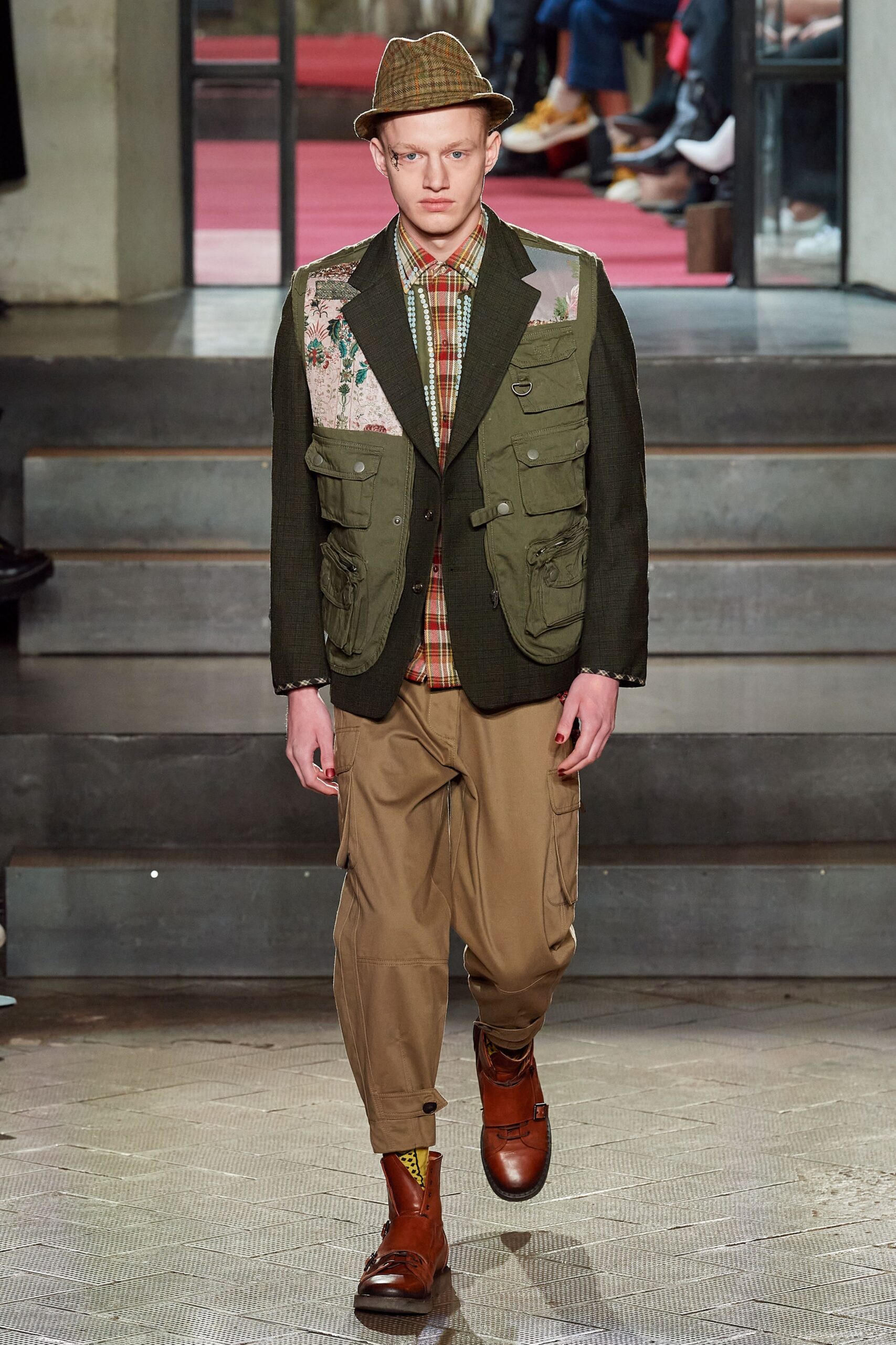 green tailored blazer with checked shirt