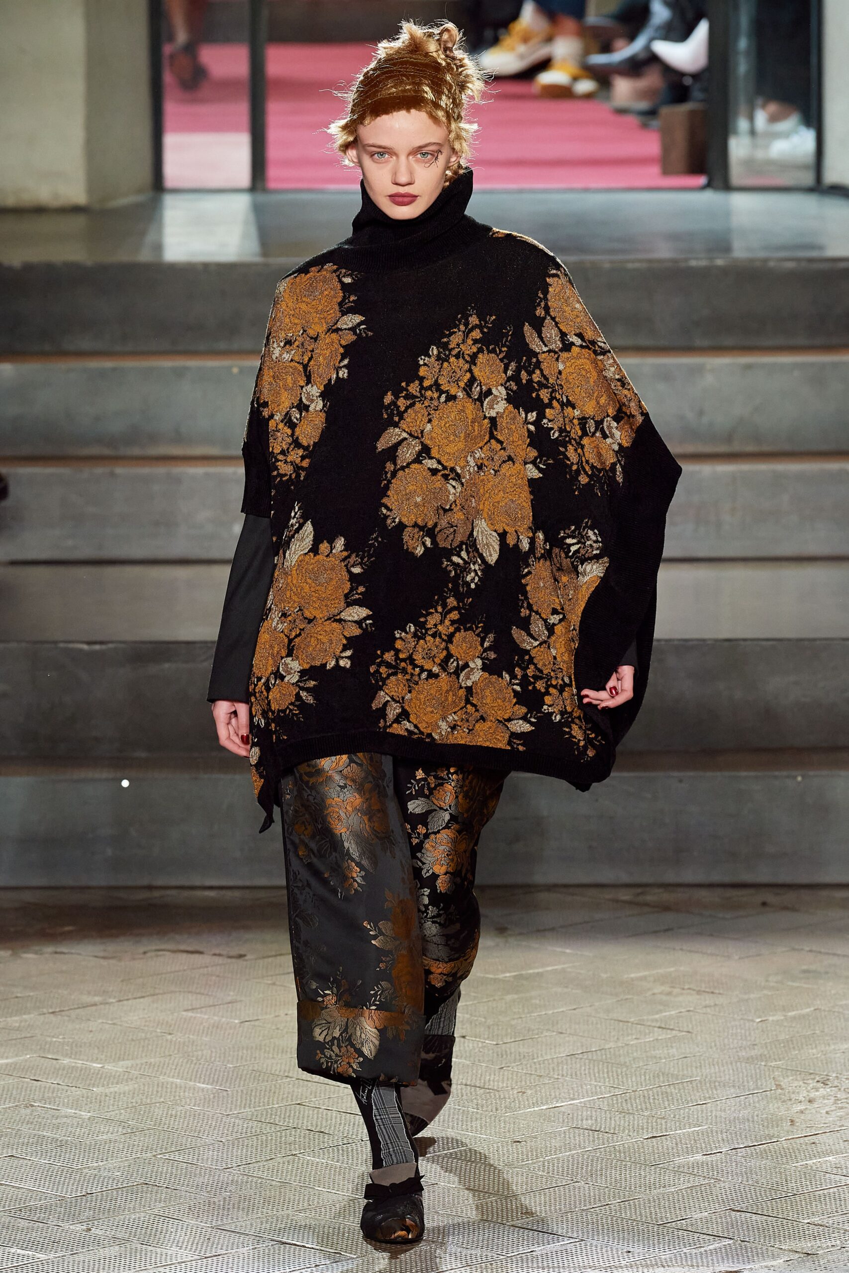 black and gold floral poncho and pants