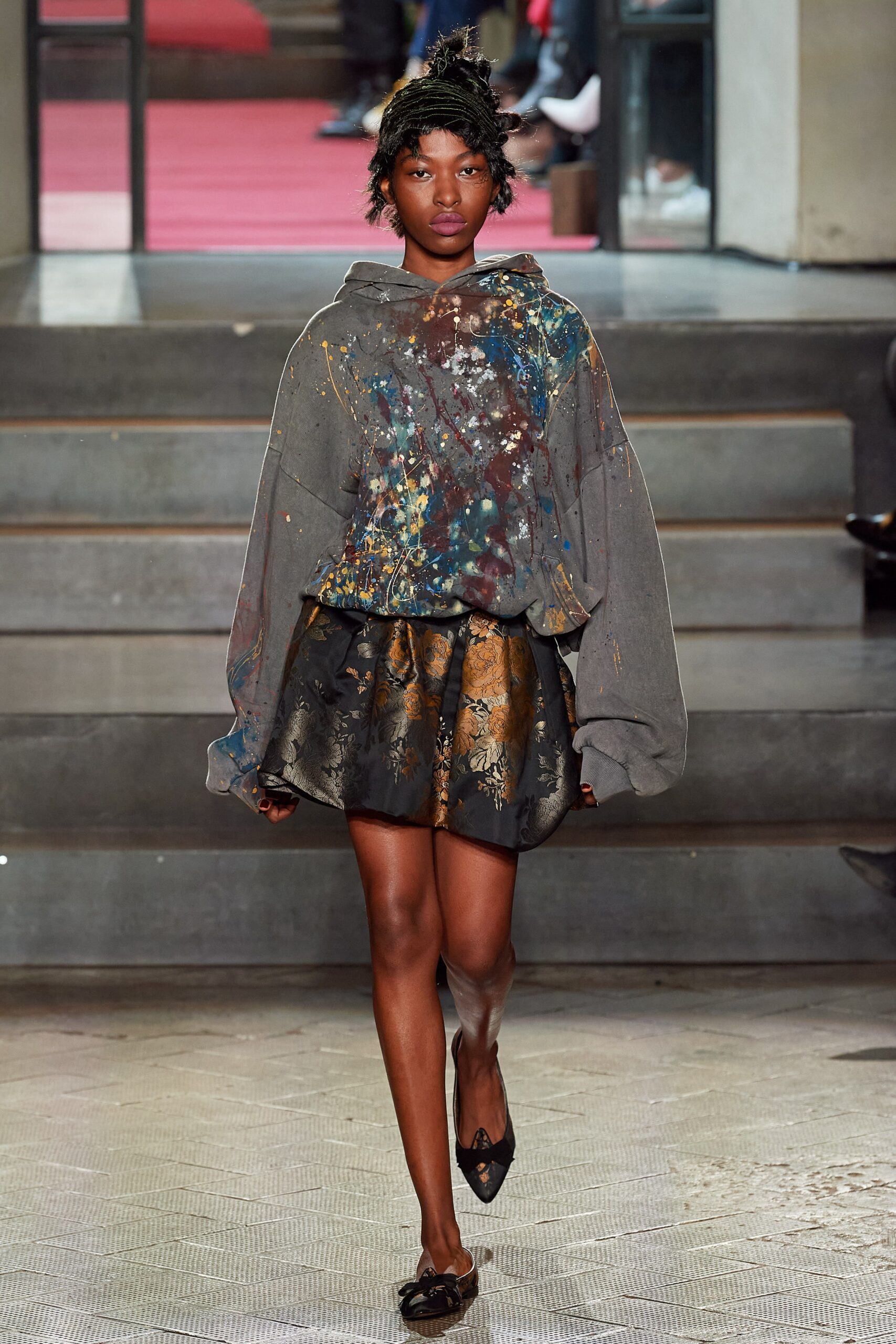 oversized gray hoodie and flared skirt