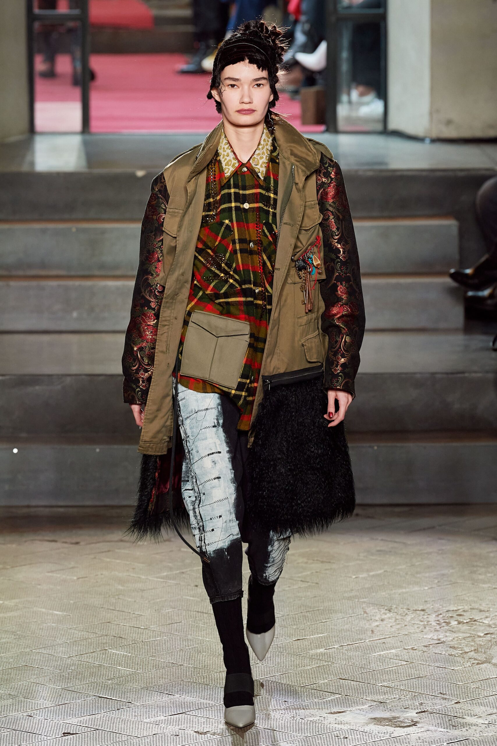 layered green coat with checked shirt