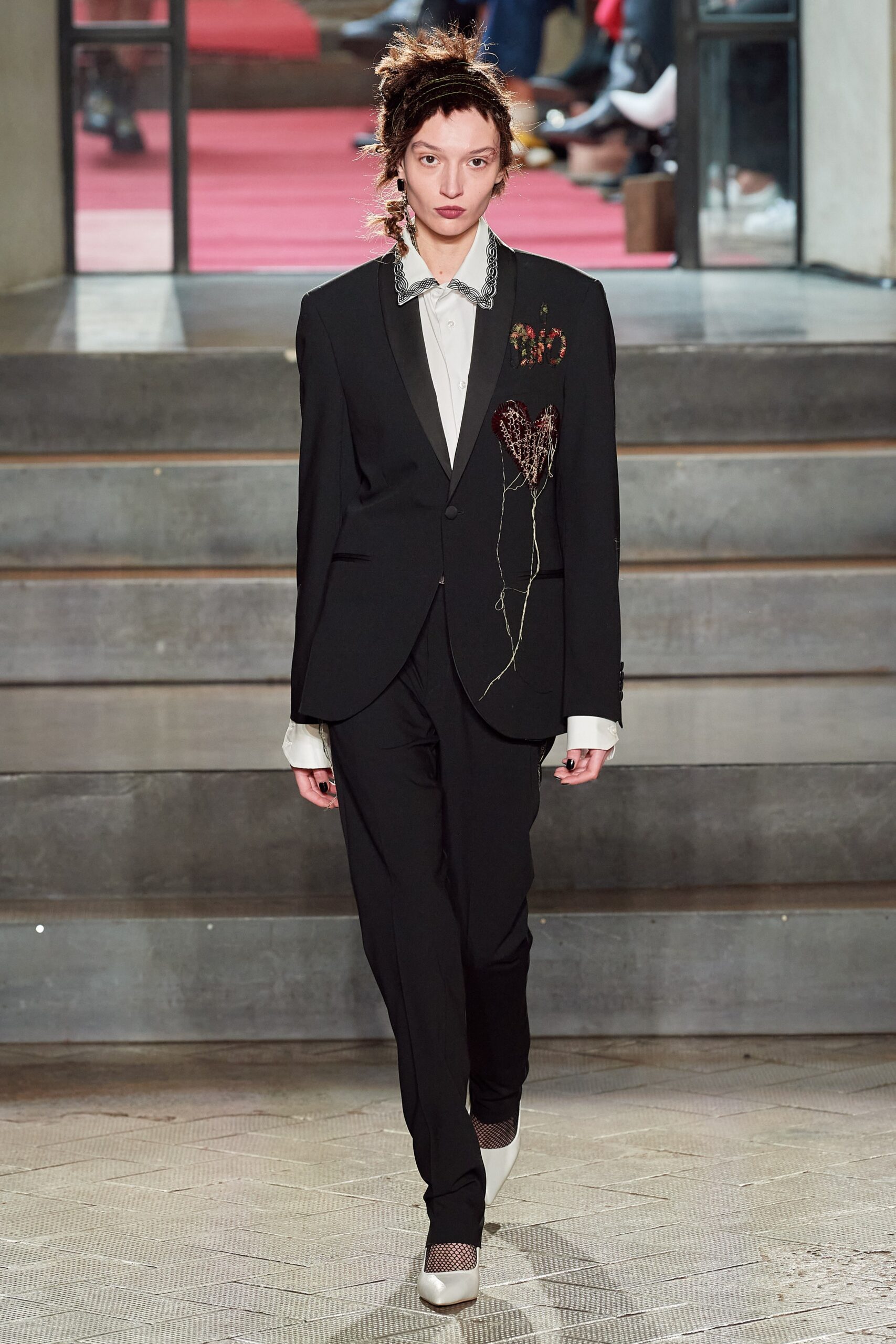 black tailored suit with white shirt