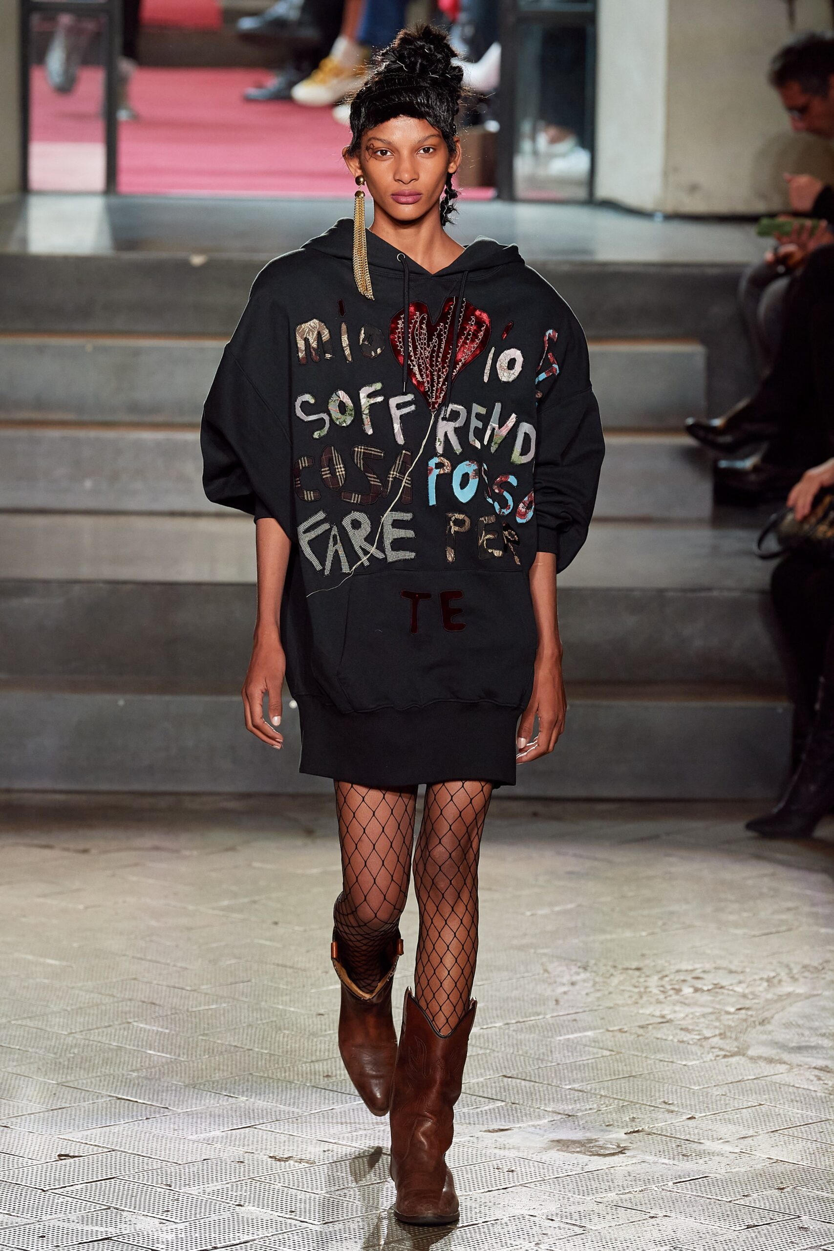 oversized black hoodie with fishnet tights
