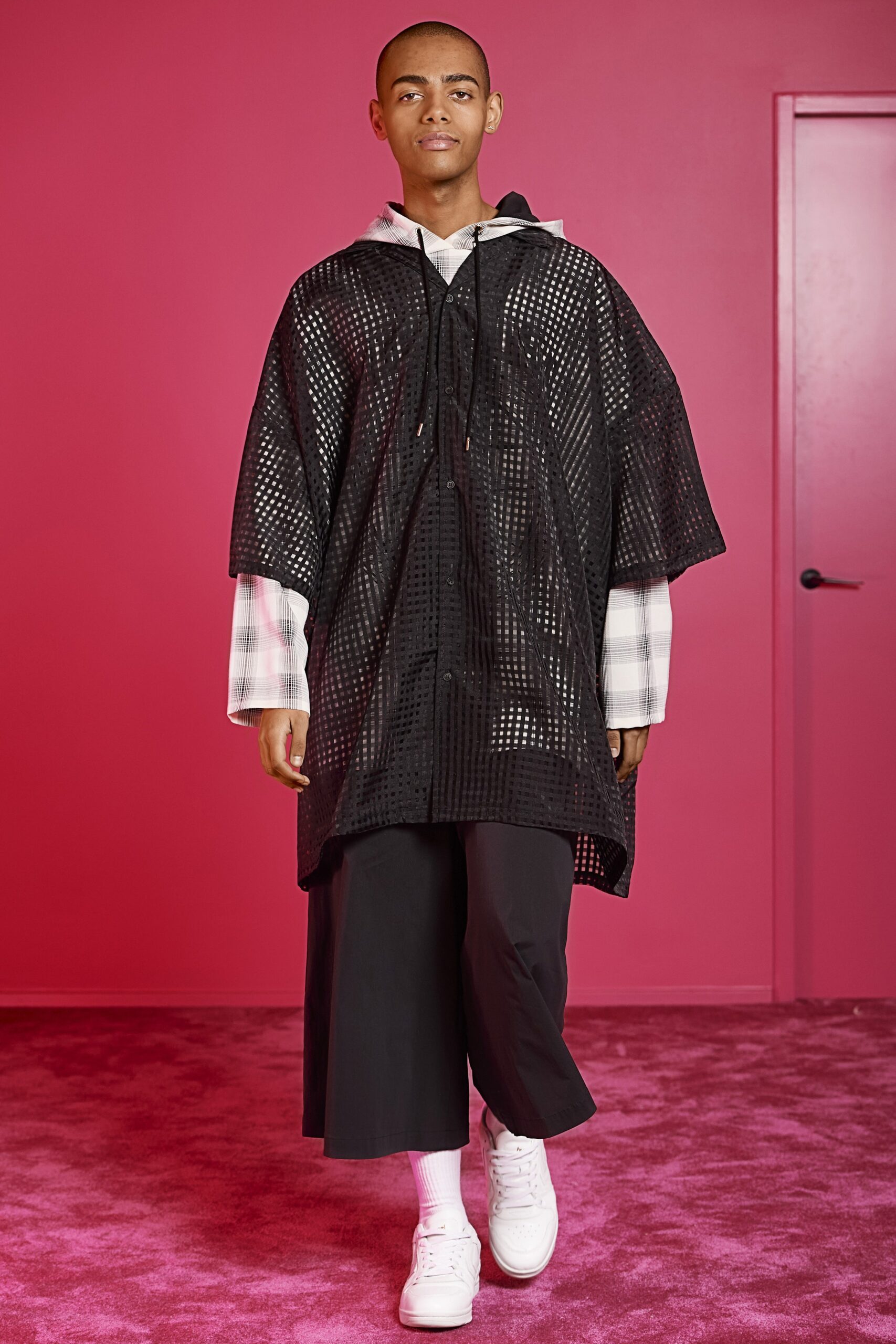 black mesh poncho with checked shirt