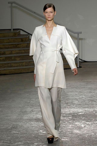 white fitted jacket and tailored pants