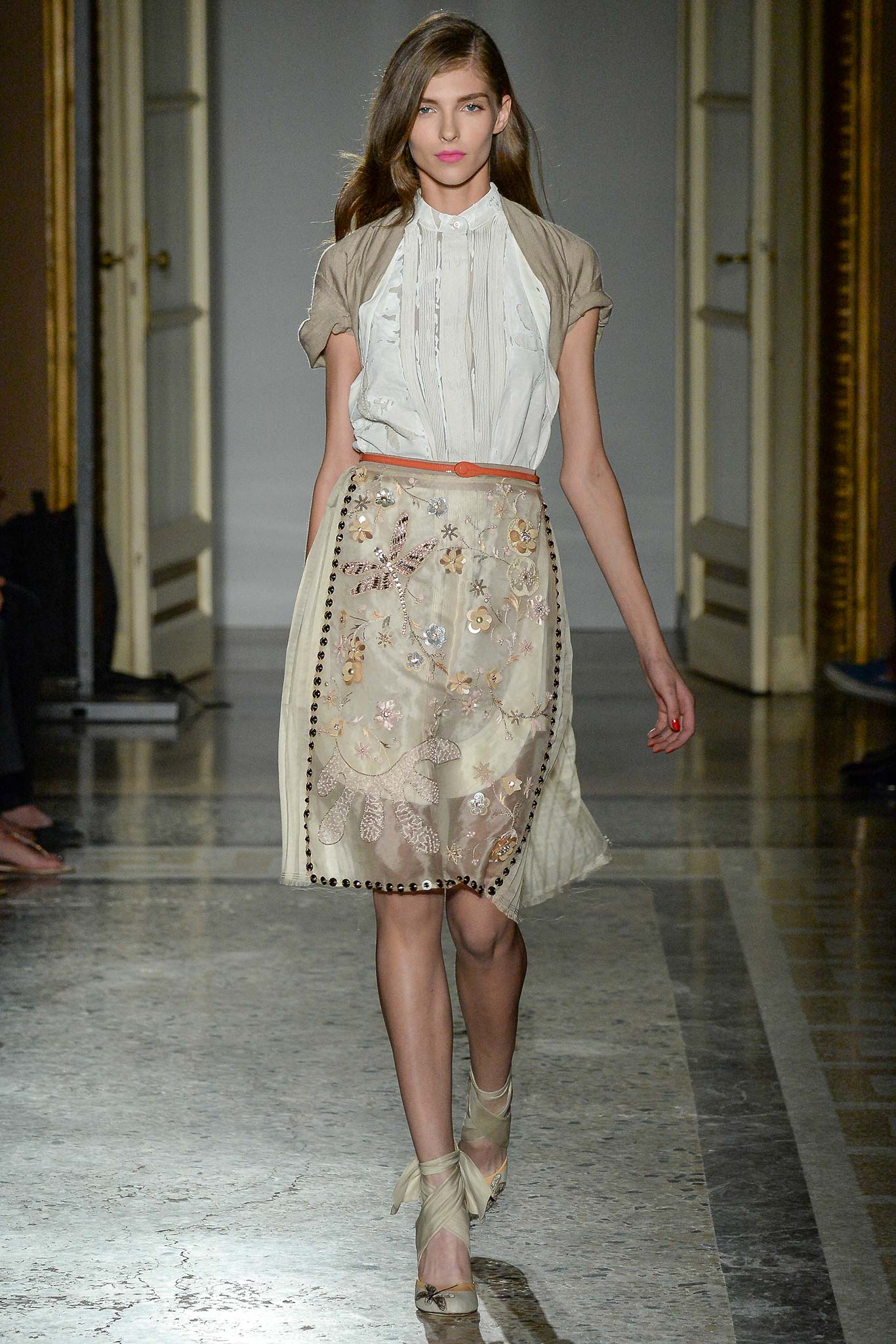 white silk blouse and beige embroidered skirt