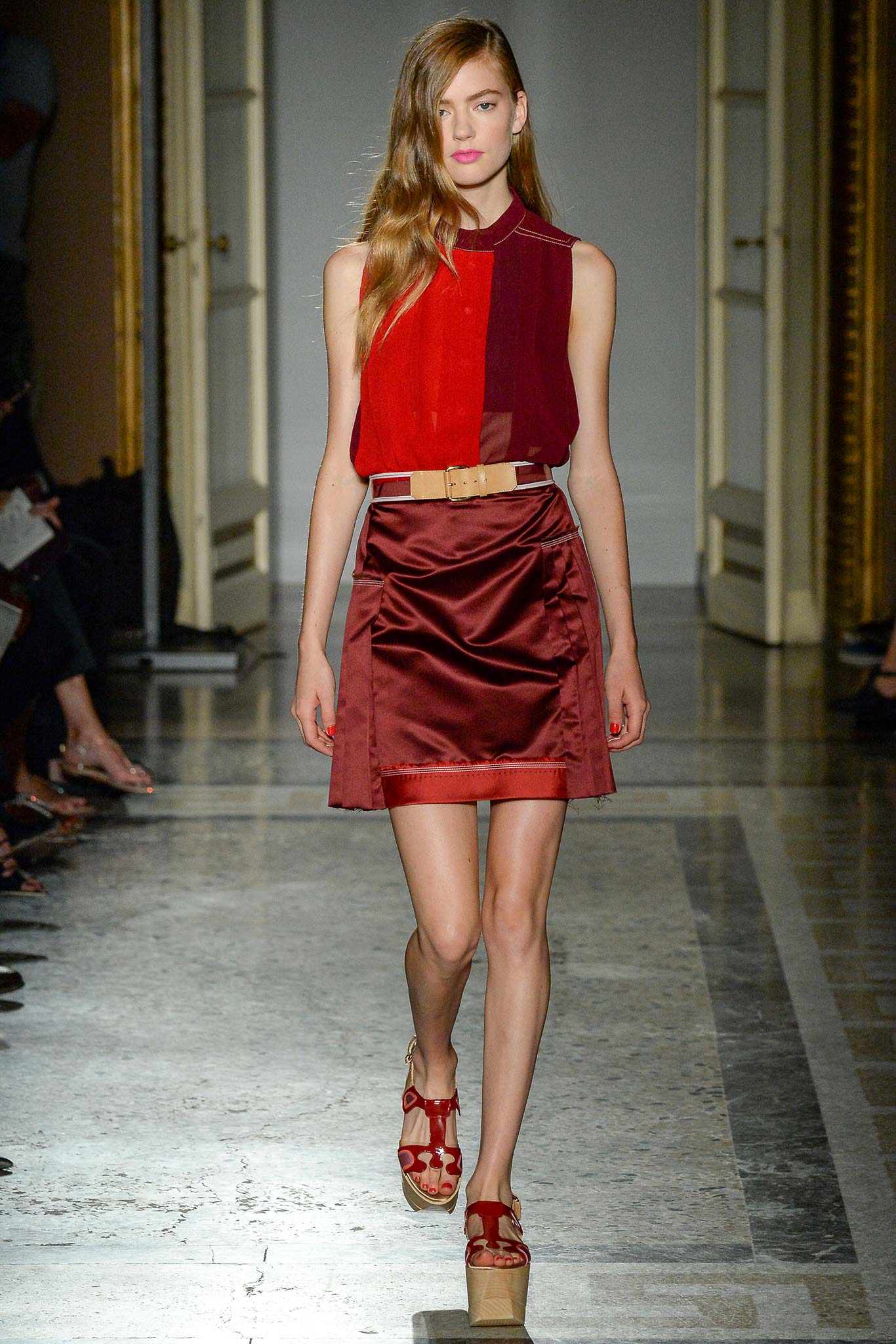 red fitted top and skirt