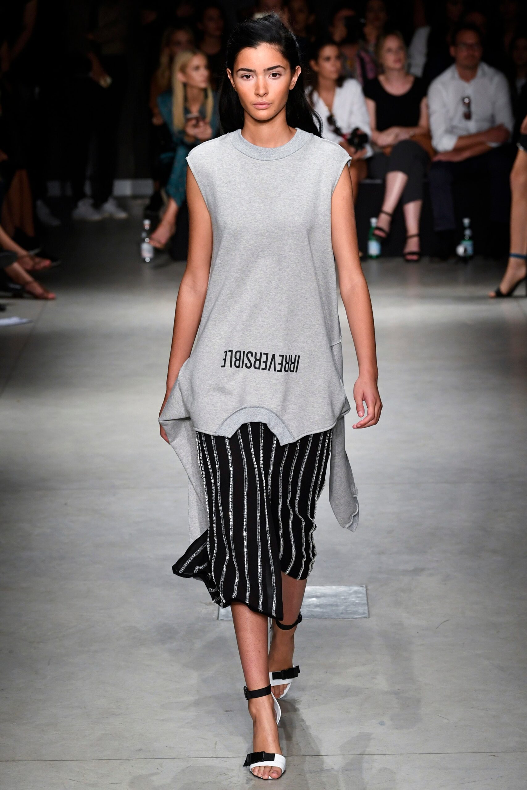 gray asymmetric top with striped skirt