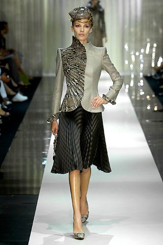 gray silk structured blazer and black skirt