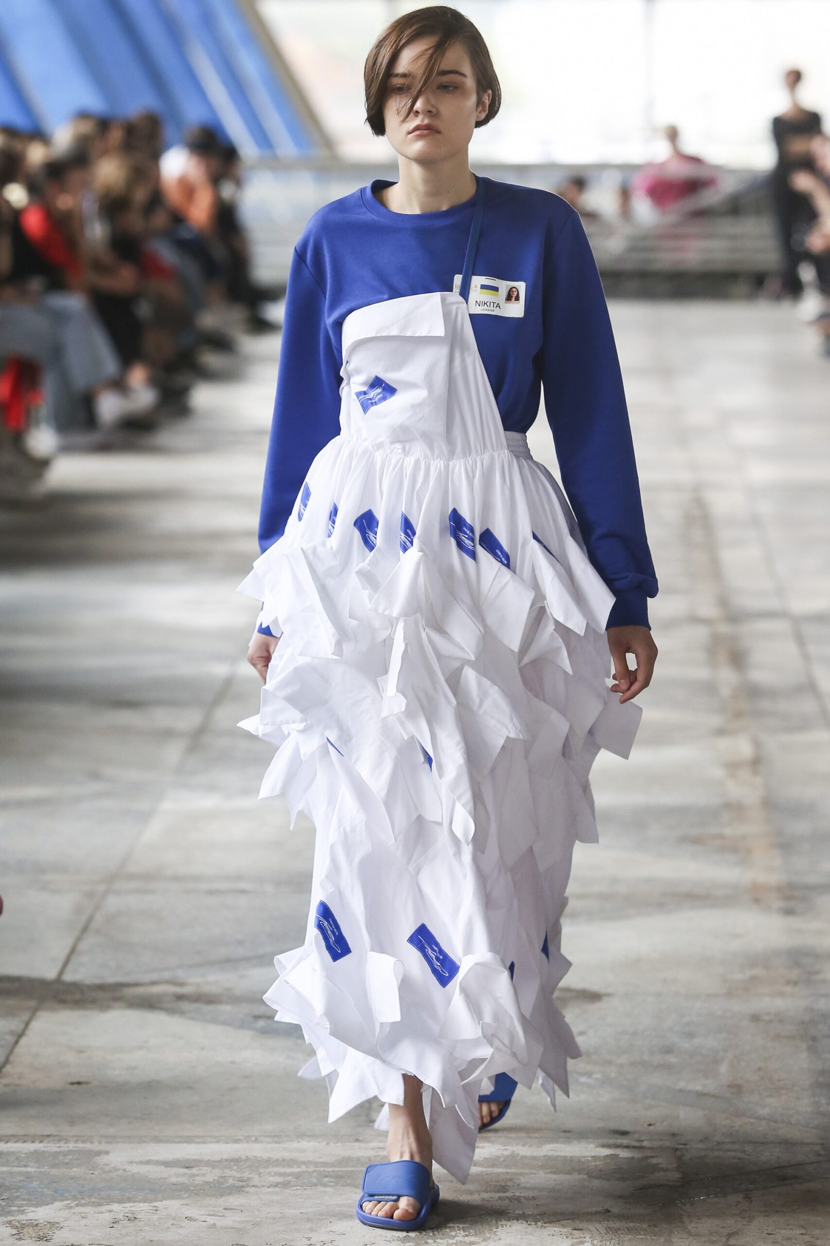 white cotton sleeveless high-neck fitted layered pleated dress