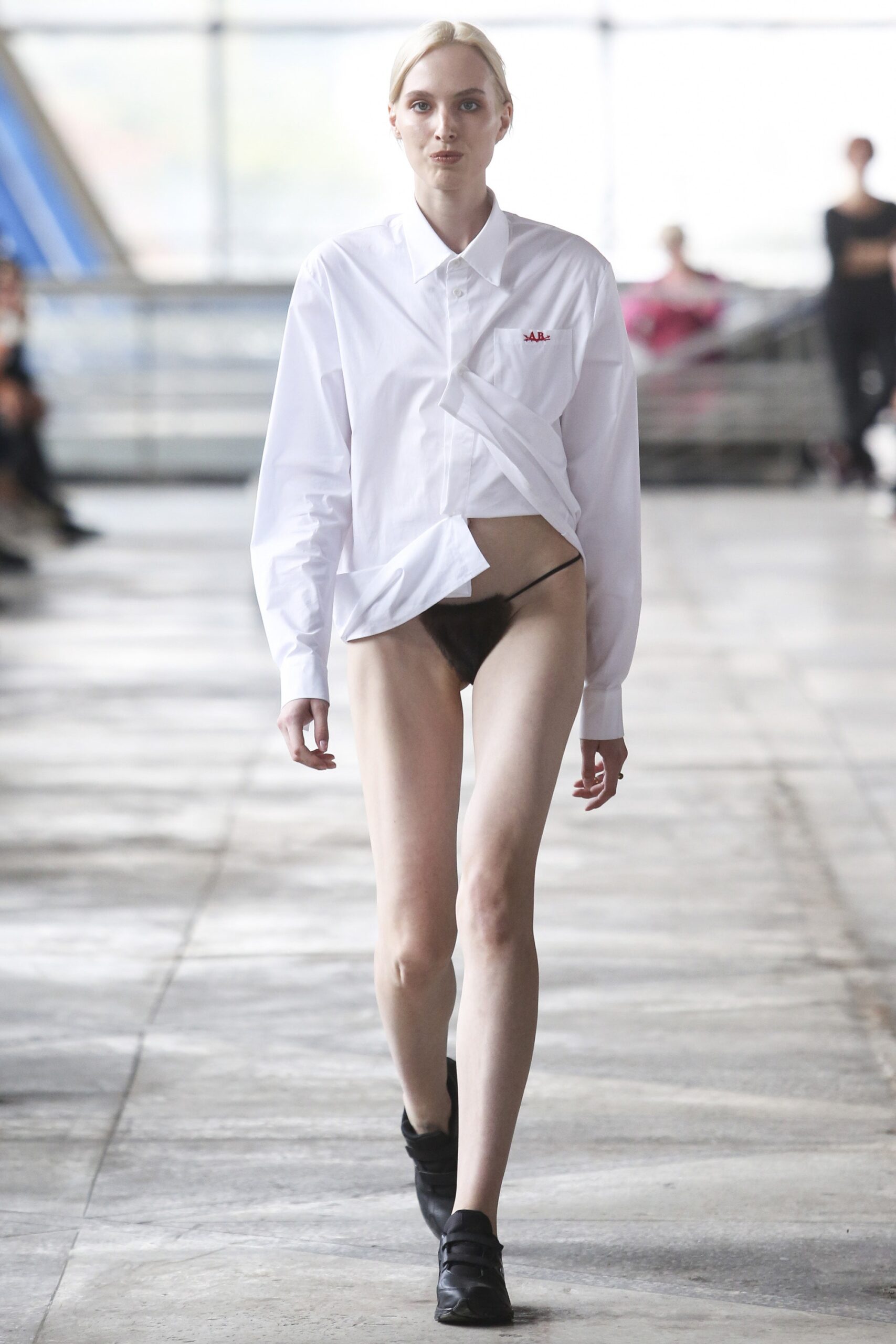 oversized white shirt with brown shorts