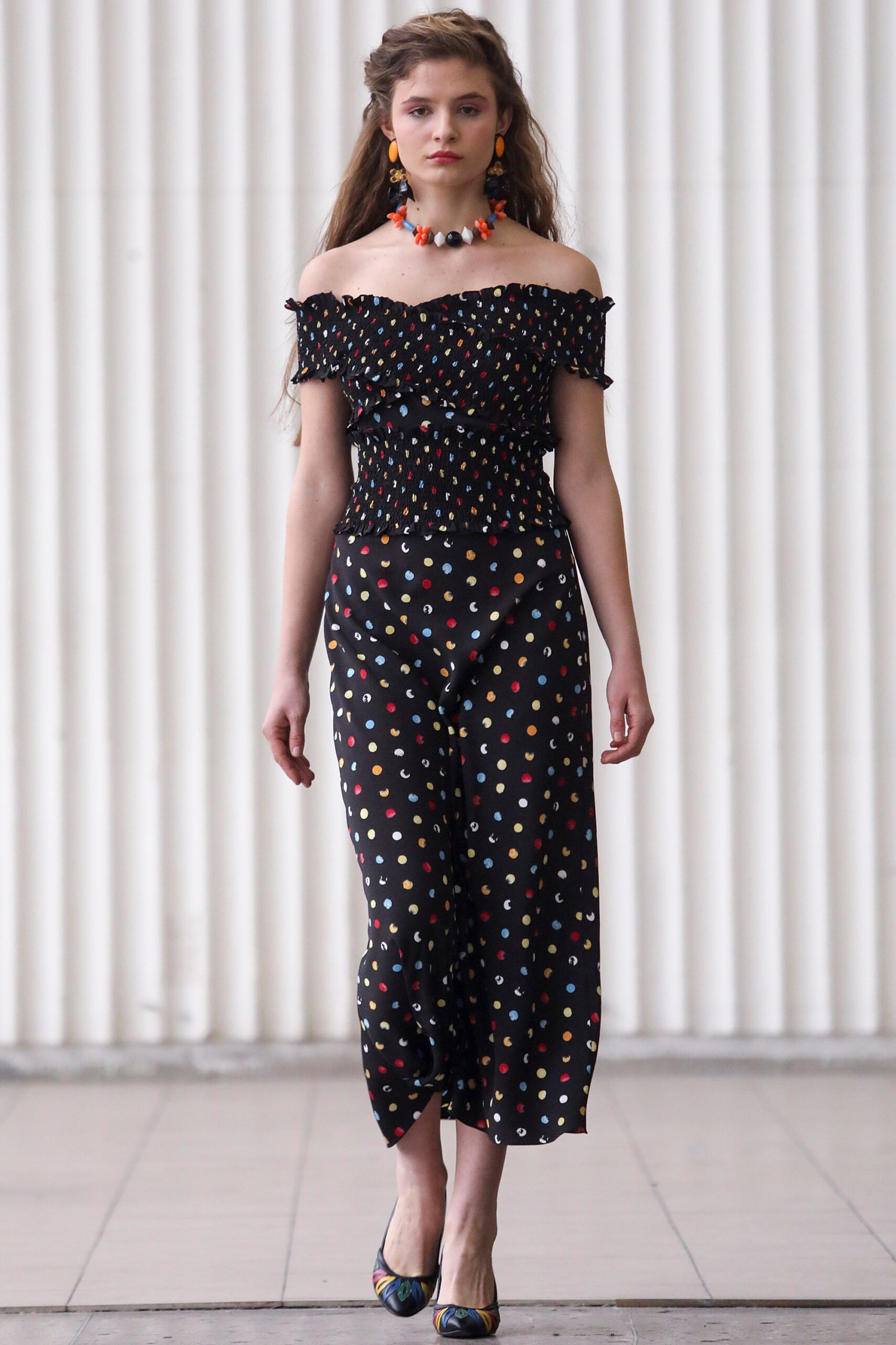 black polka-dot off-shoulder top and pants