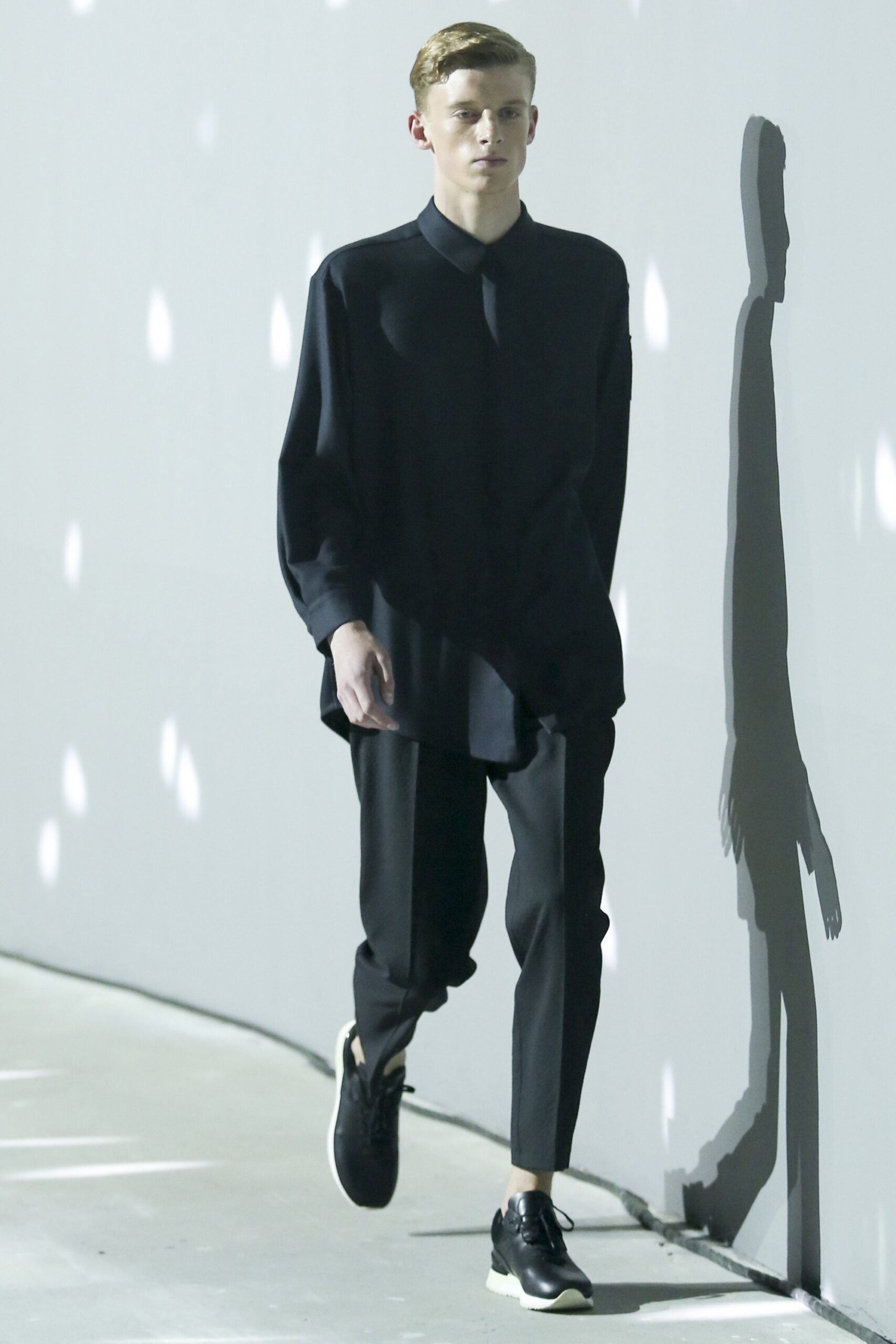 black oversized shirt and tailored pants