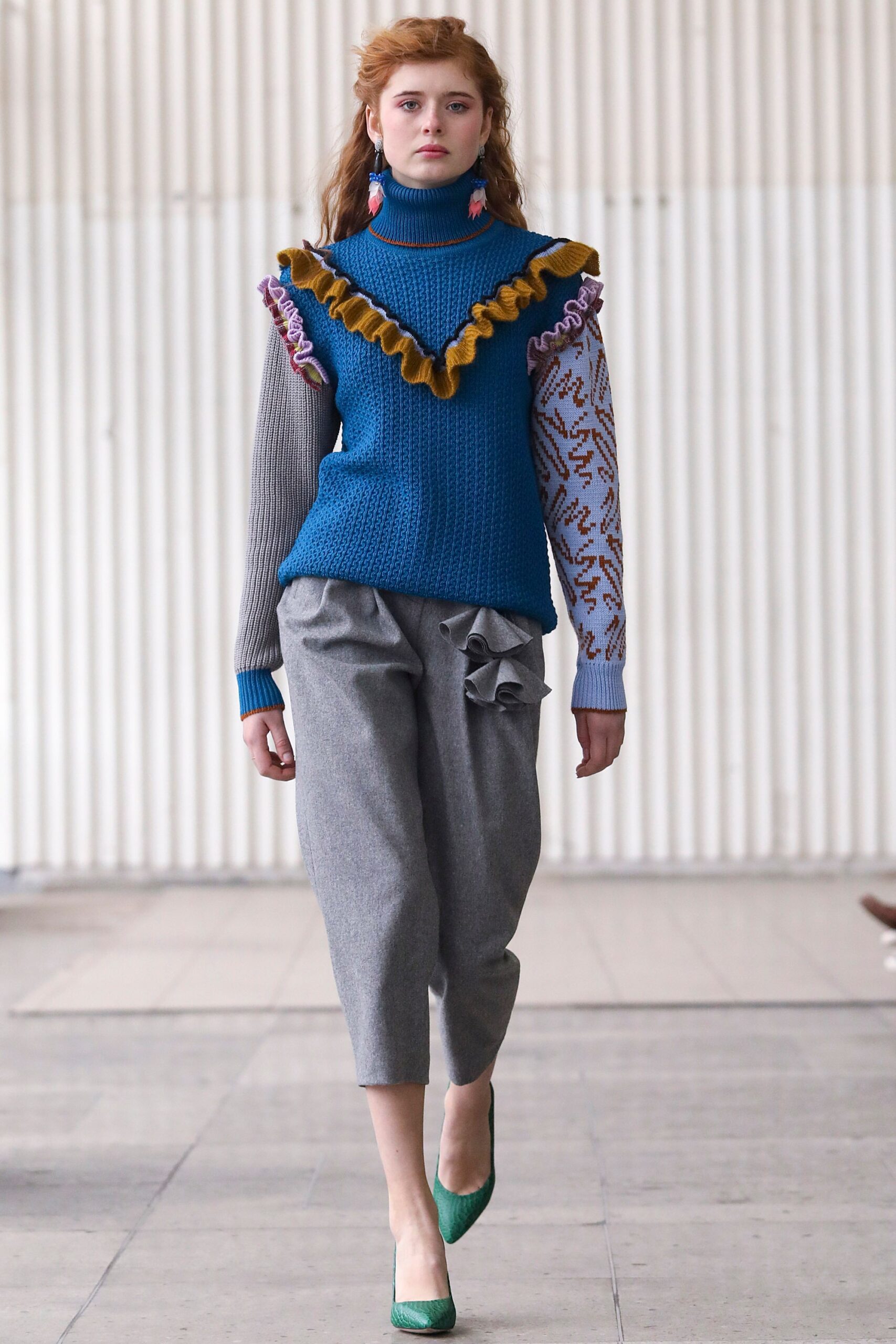 blue fitted sweater with ruffles