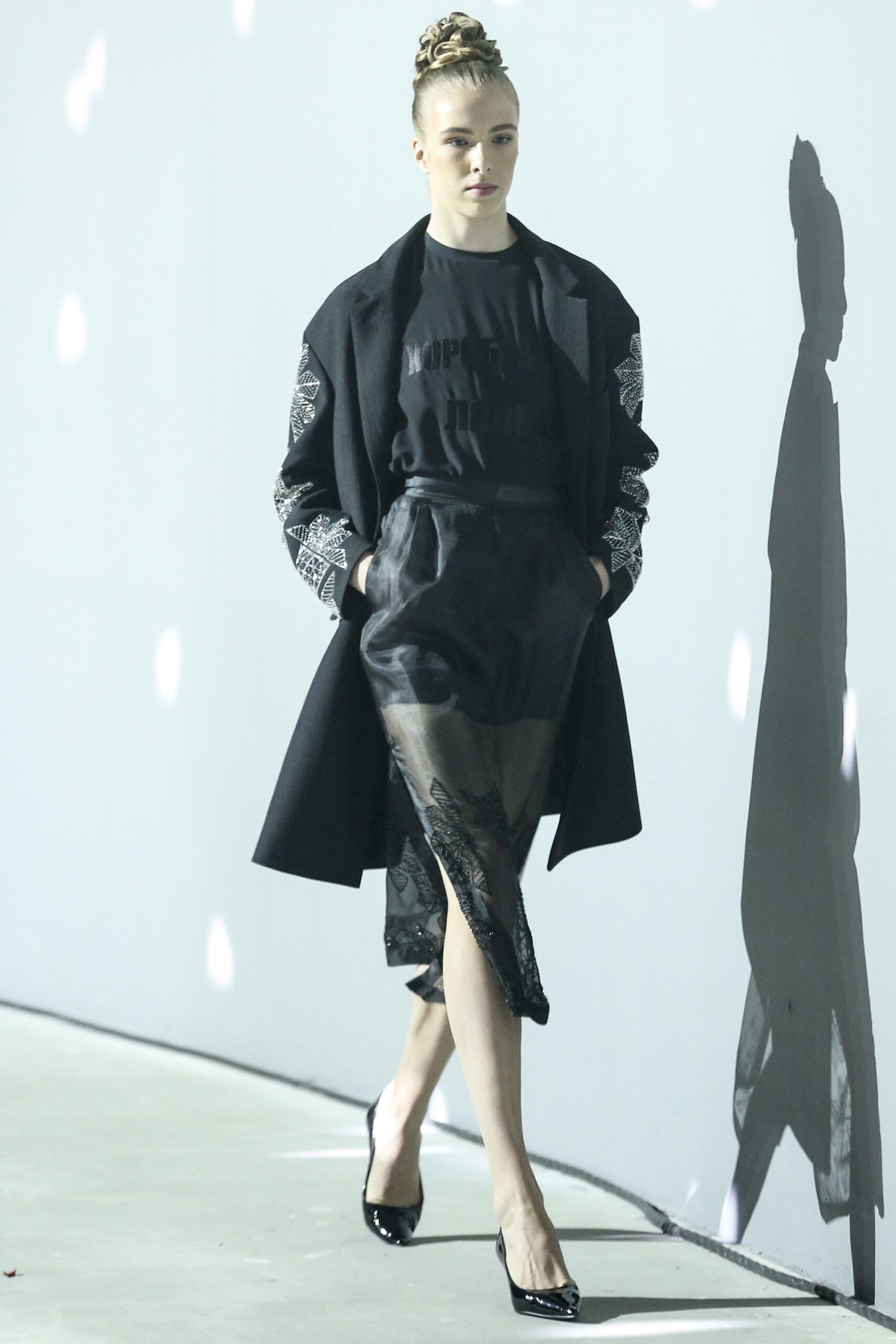 black wool coat with sheer skirt