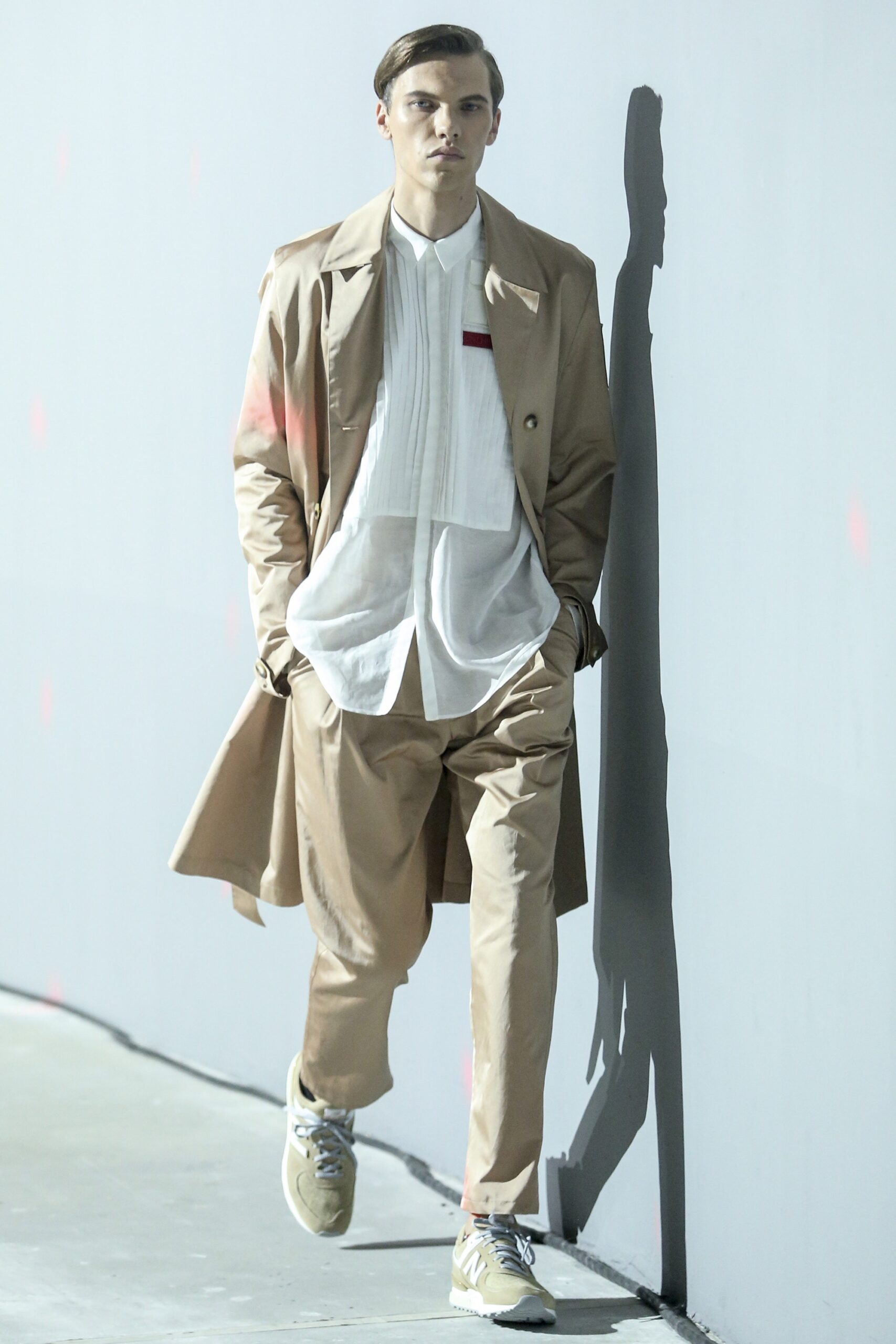 beige trench coat with white shirt