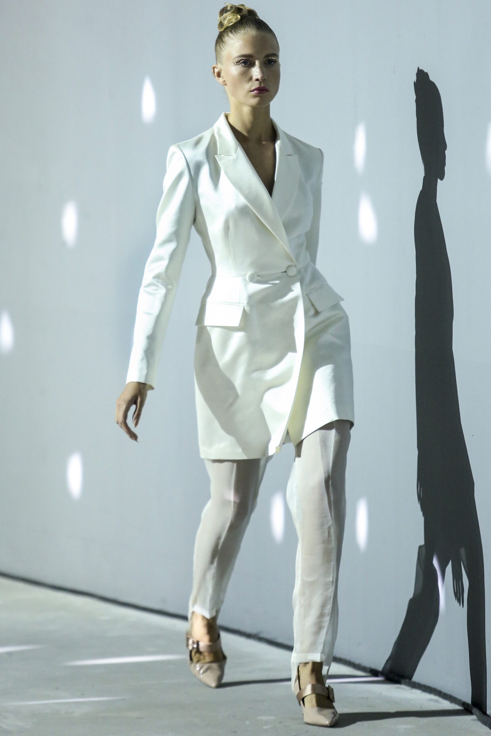 white silk fitted blazer with sheer pants