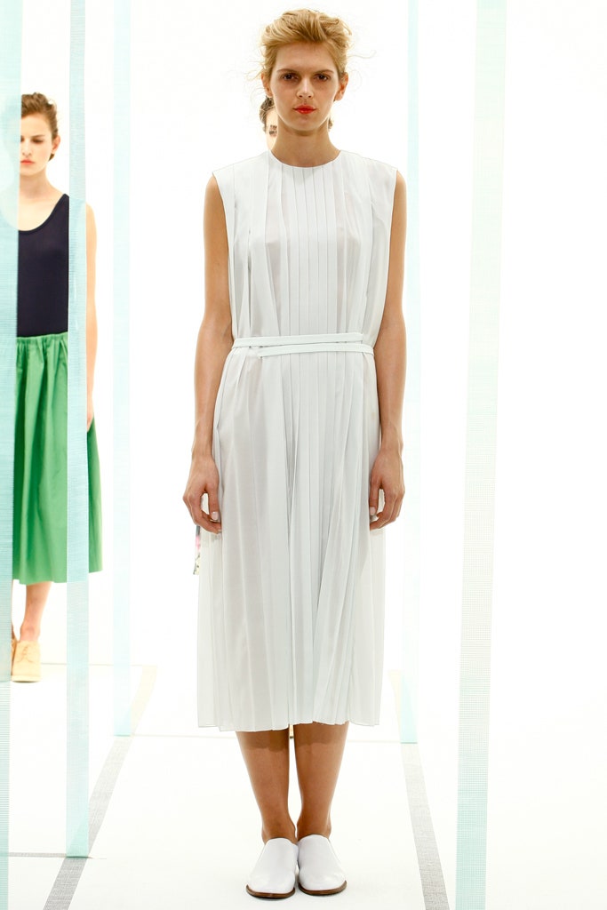 white pleated sleeveless dress