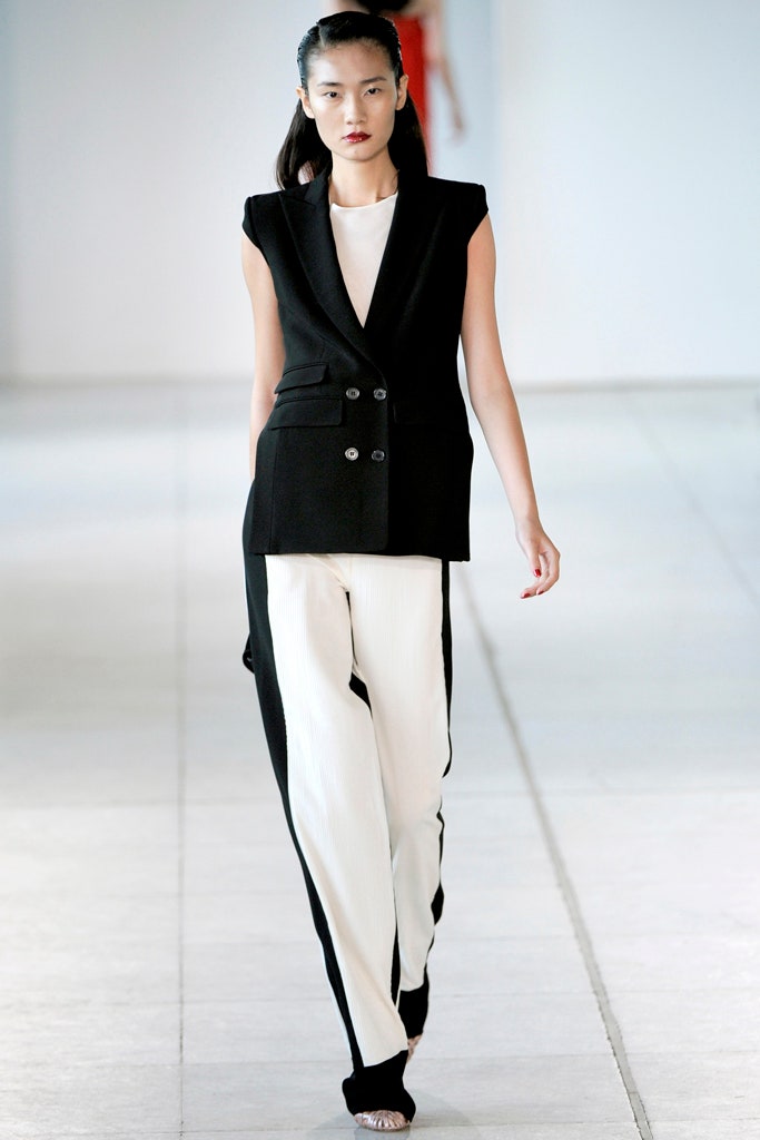 black tailored blazer with white pants