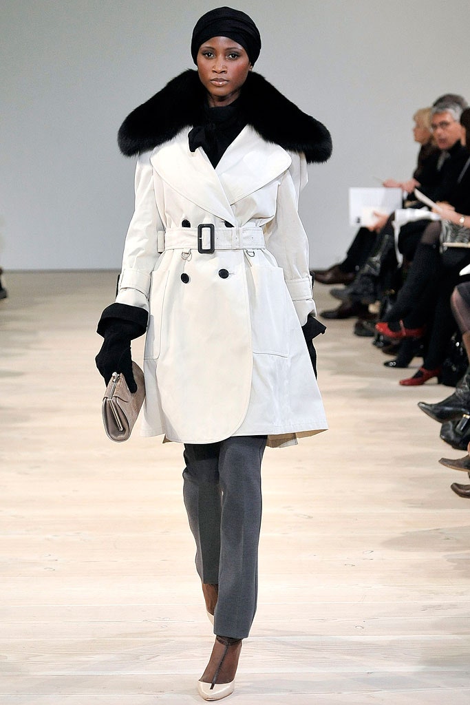 white belted coat with gray pants