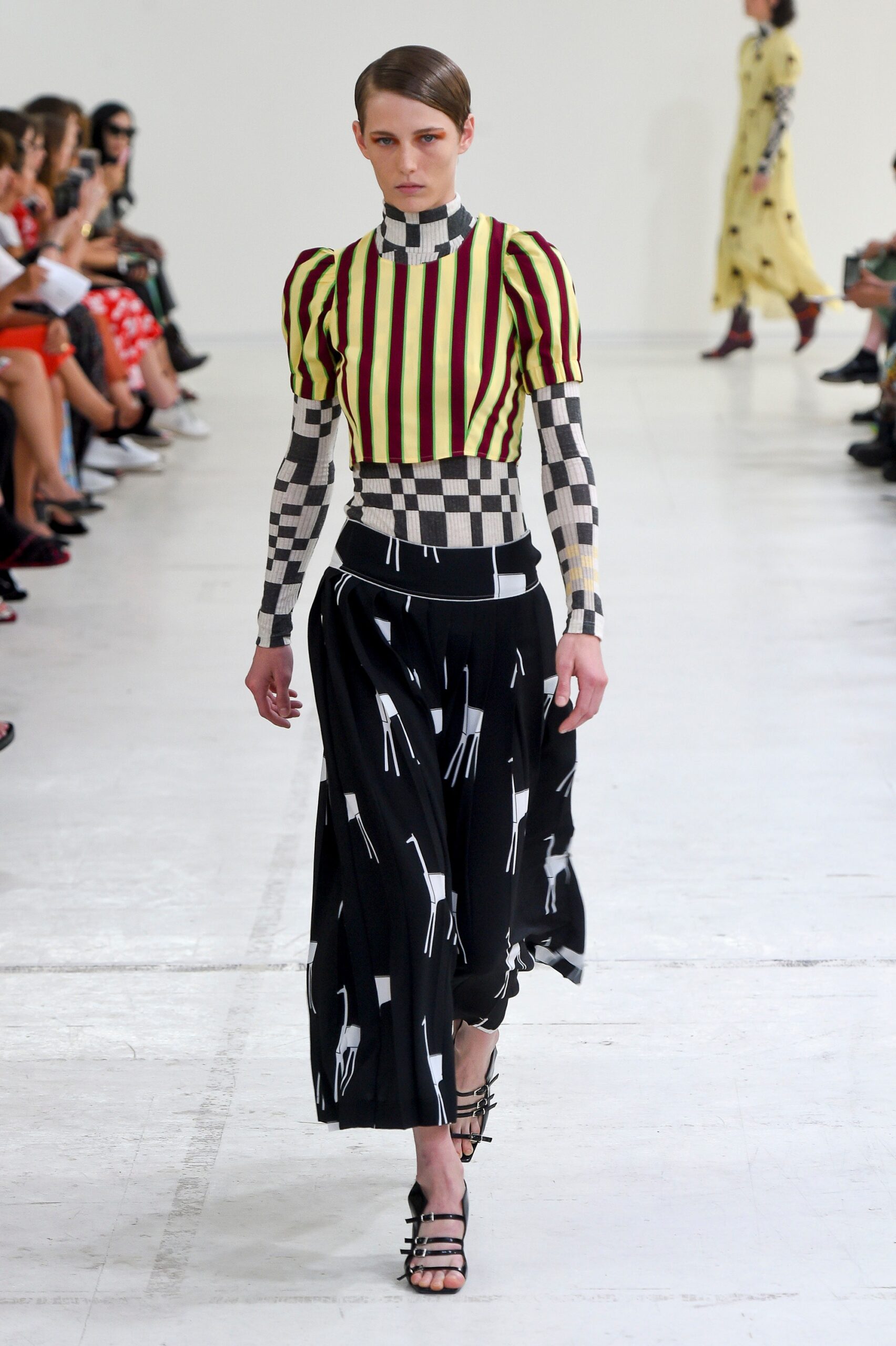 fitted striped top and pleated skirt