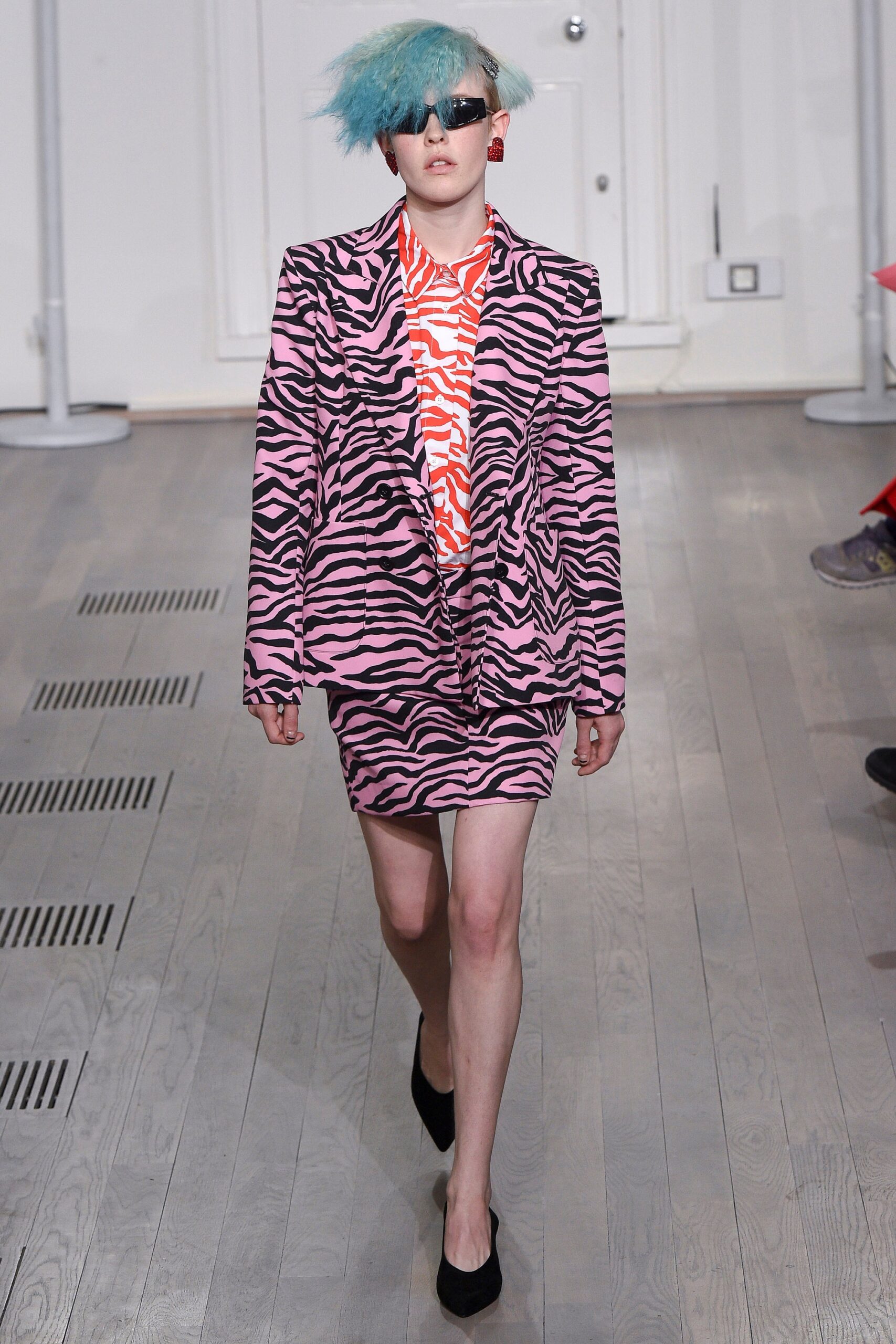 pink black printed blazer with orange dress