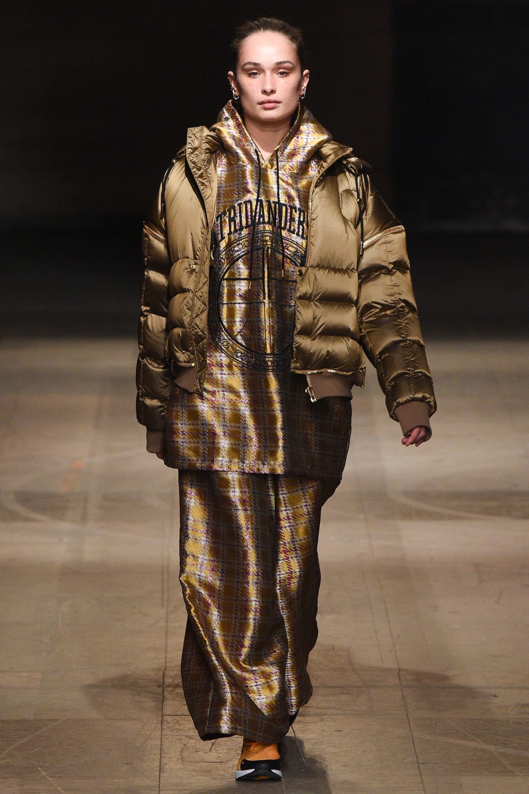 gray hoodie with gold puffer jacket