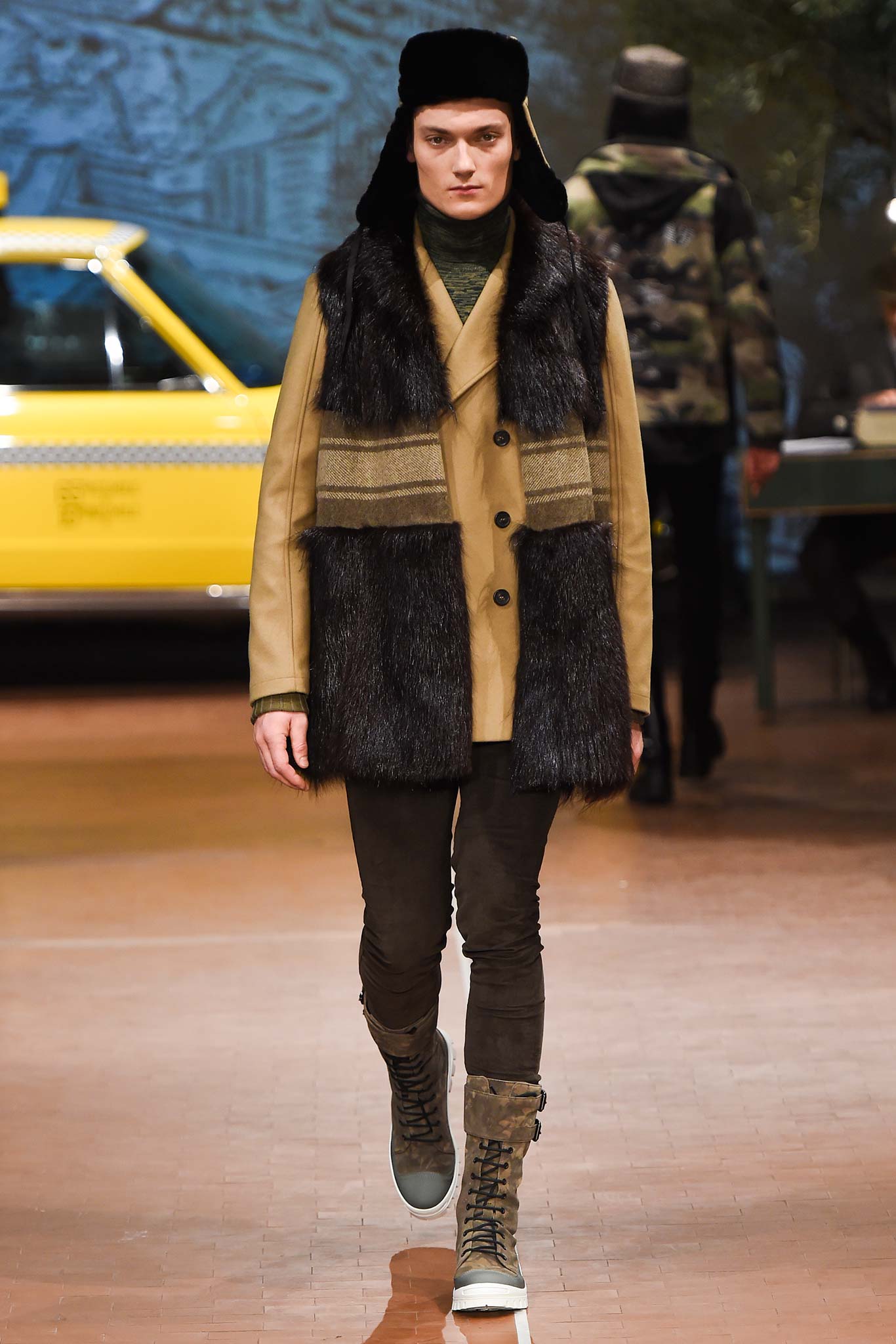 beige fur coat with black pants