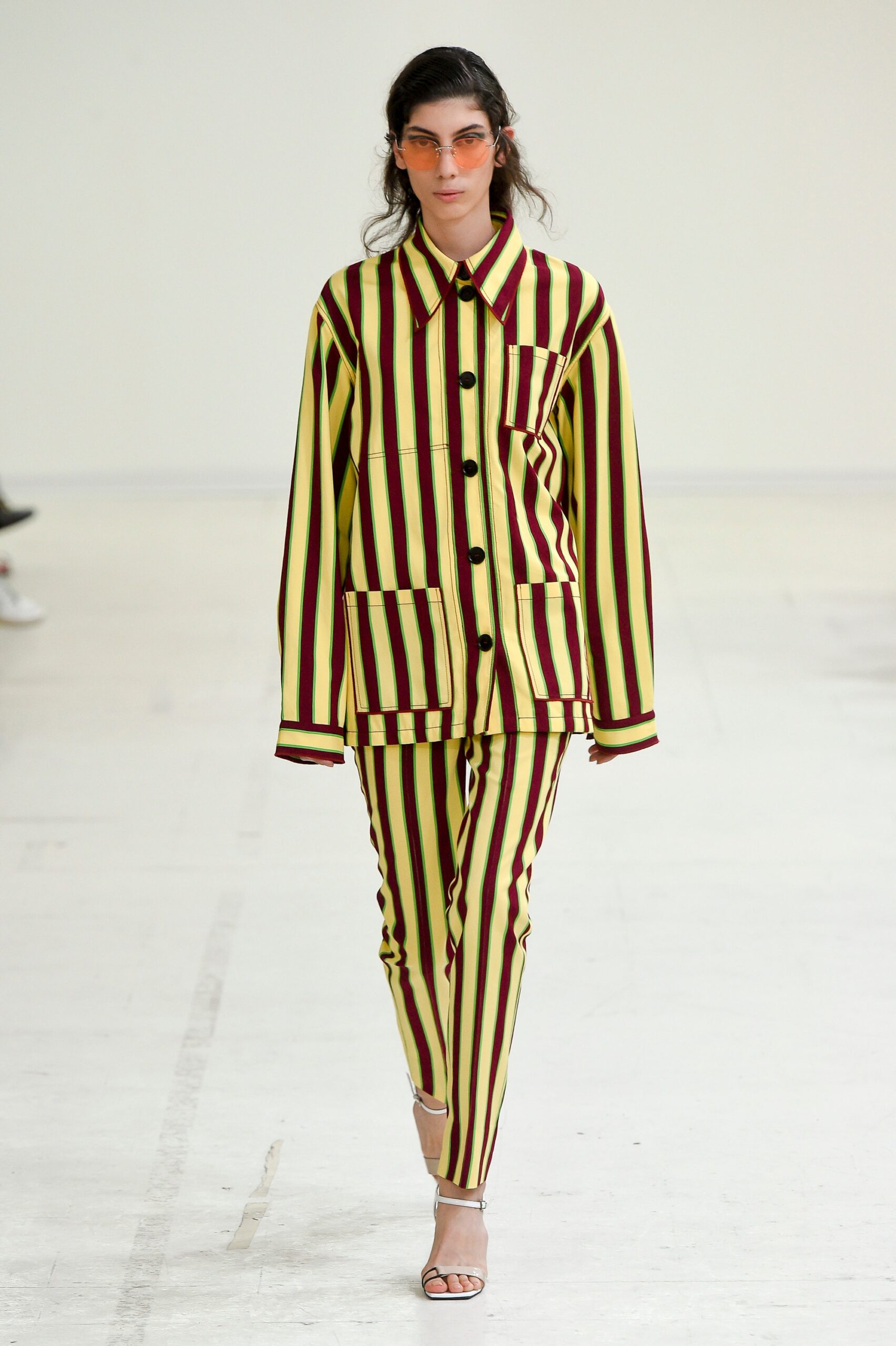 striped yellow and red jacket and pants