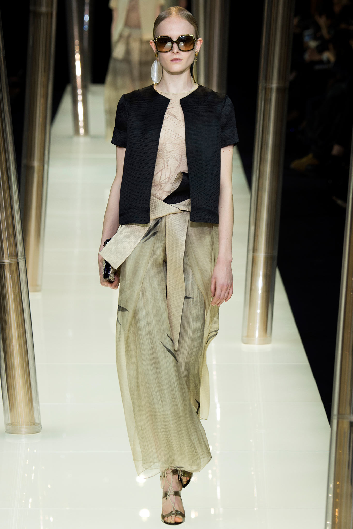 black silk top and beige pleated skirt