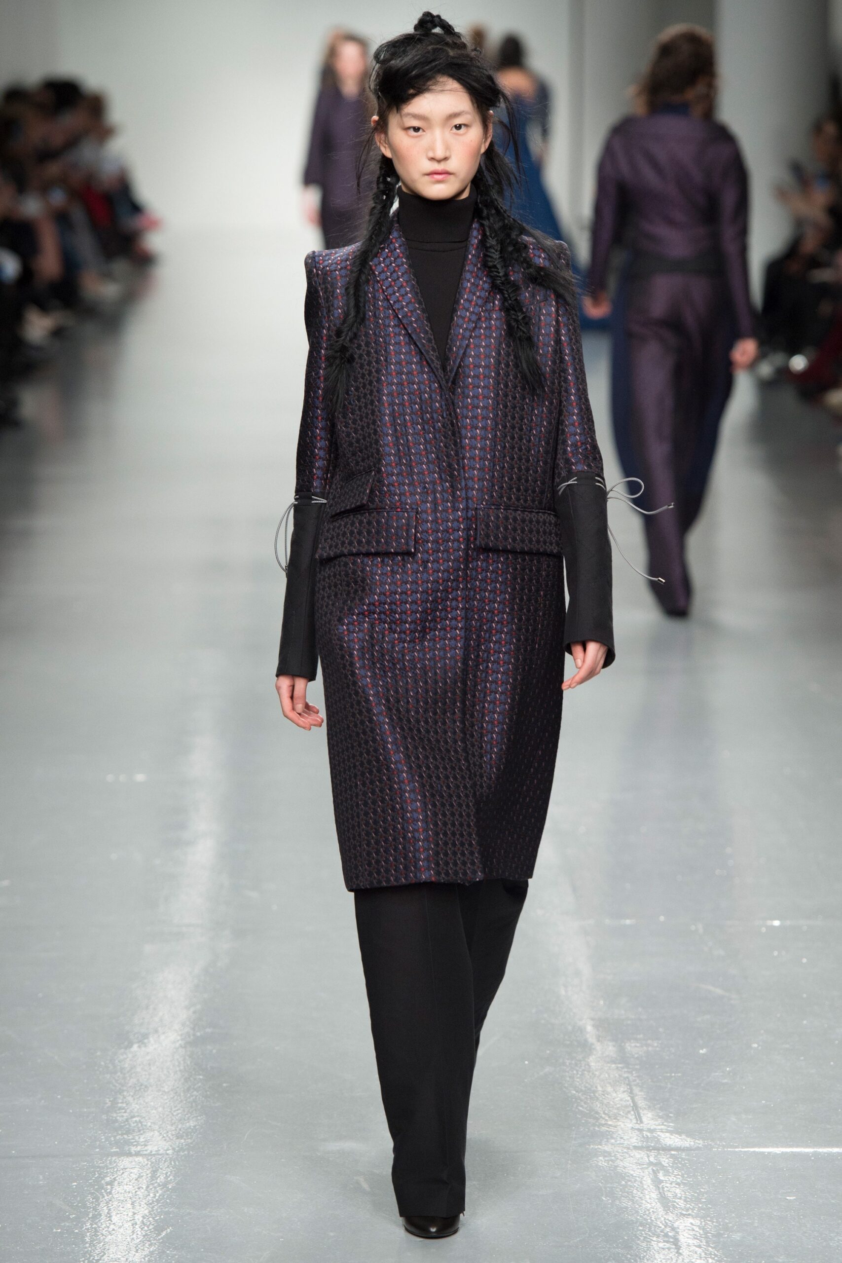 tailored black and purple blazer with fitted pants