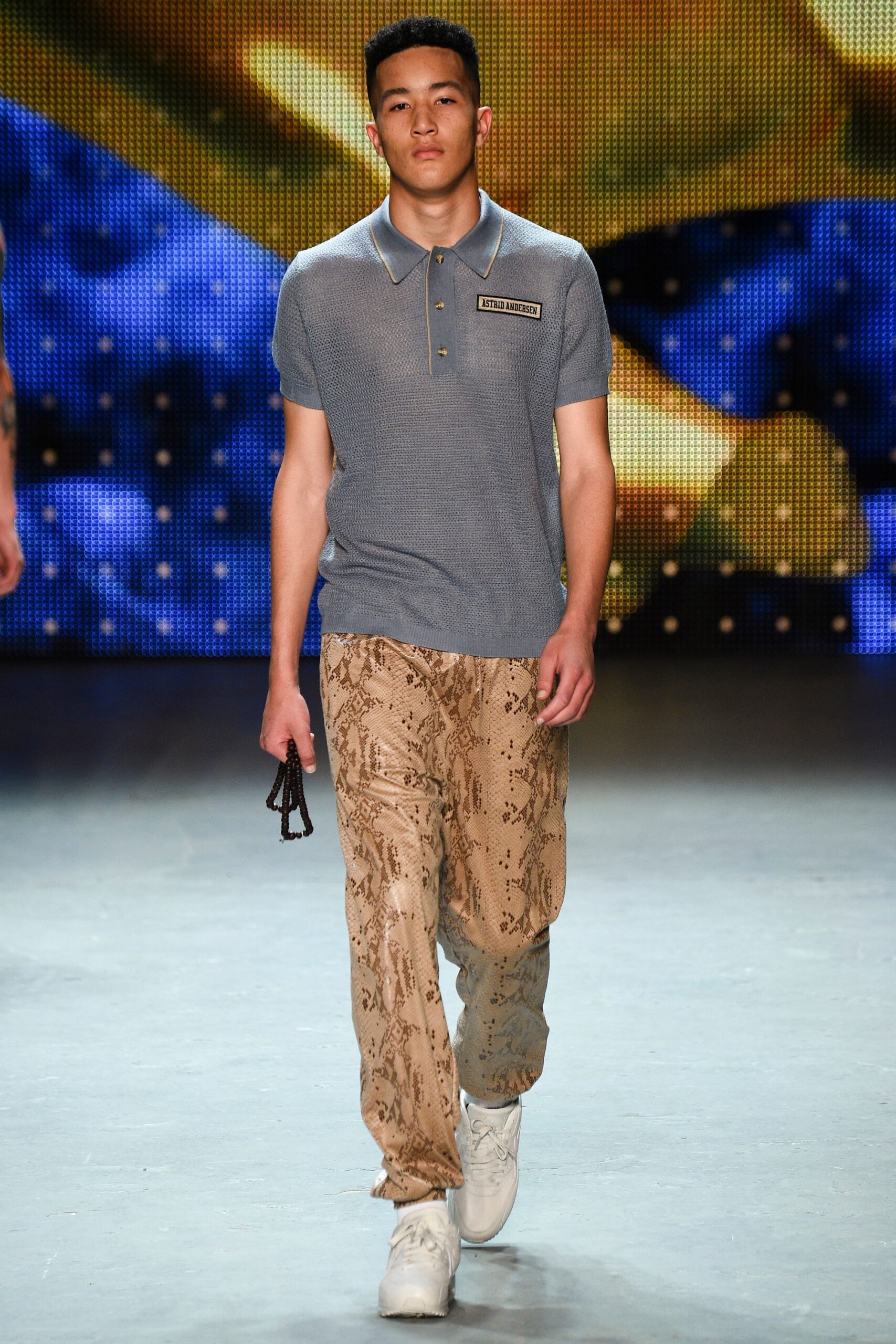 gray collared shirt beige printed pants