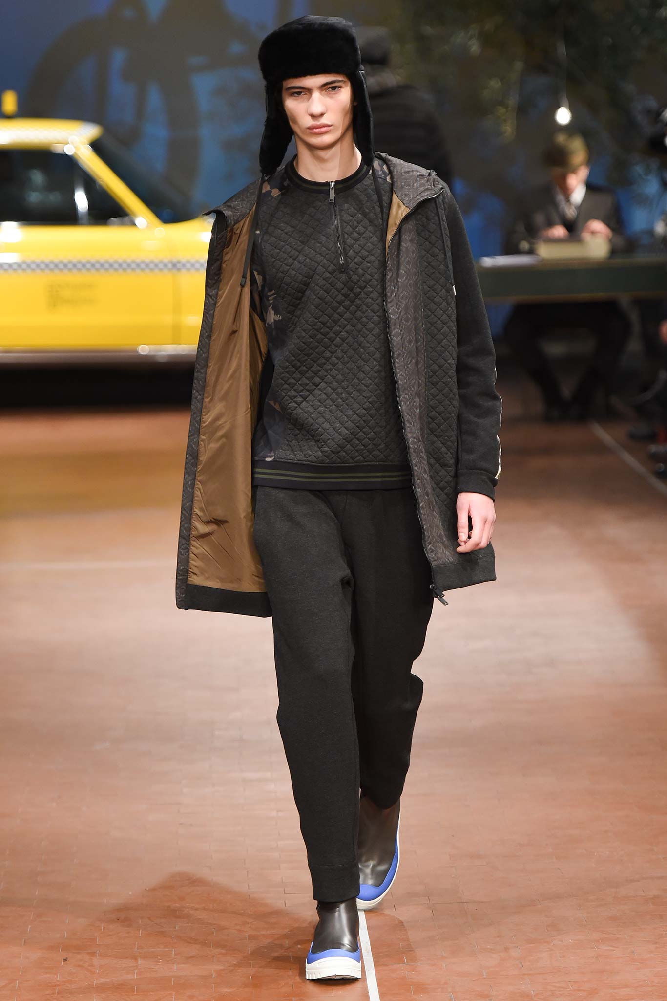 black relaxed coat and sweater