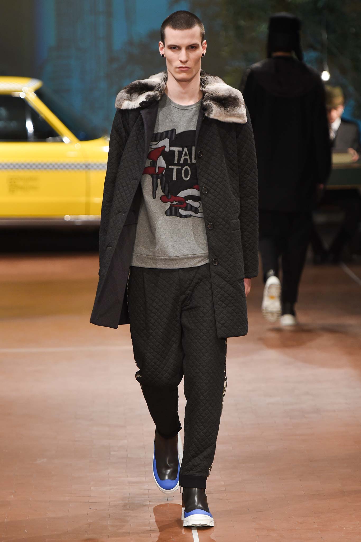 black quilted coat with gray top
