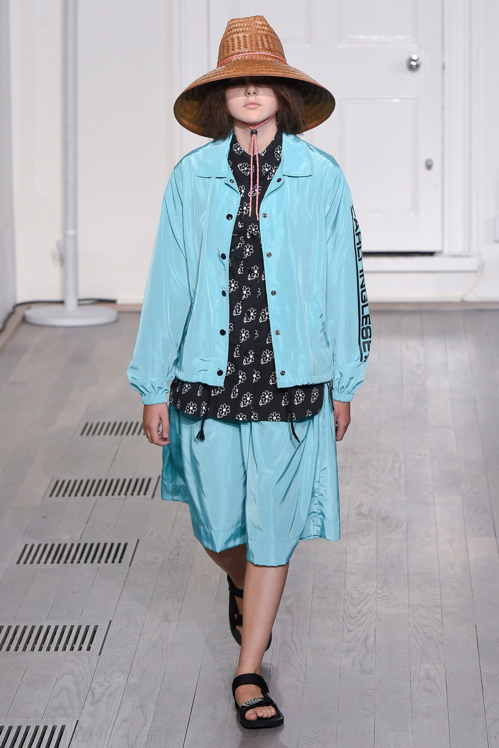 blue silk jacket with black shirt