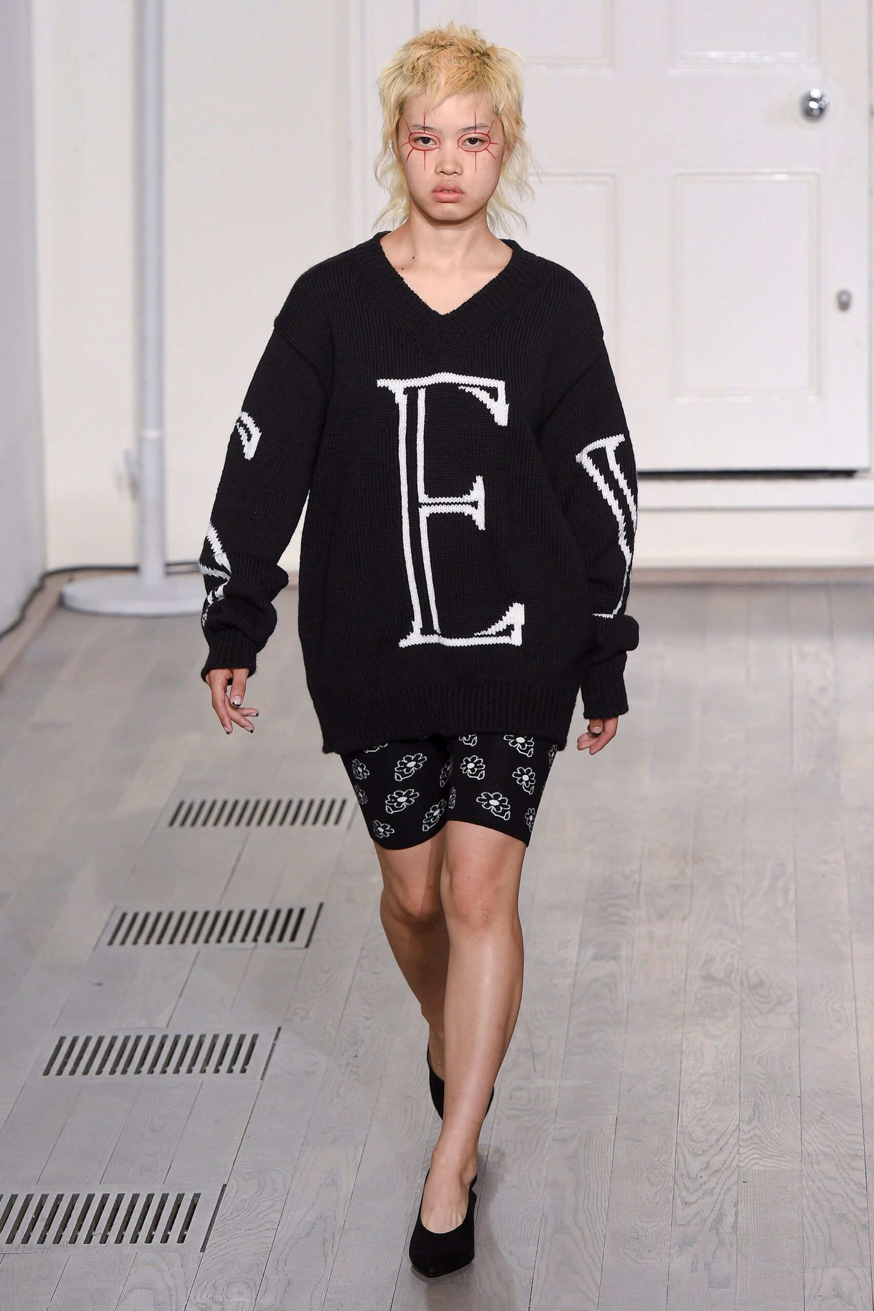 black oversized sweater and shorts