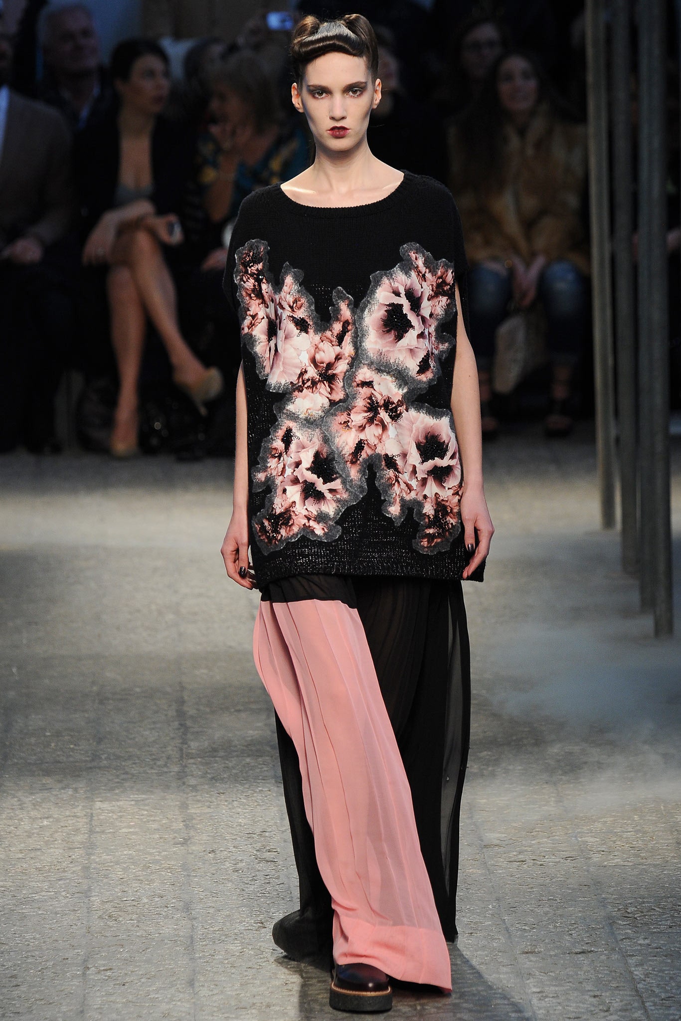 black and pink printed top with layered pants