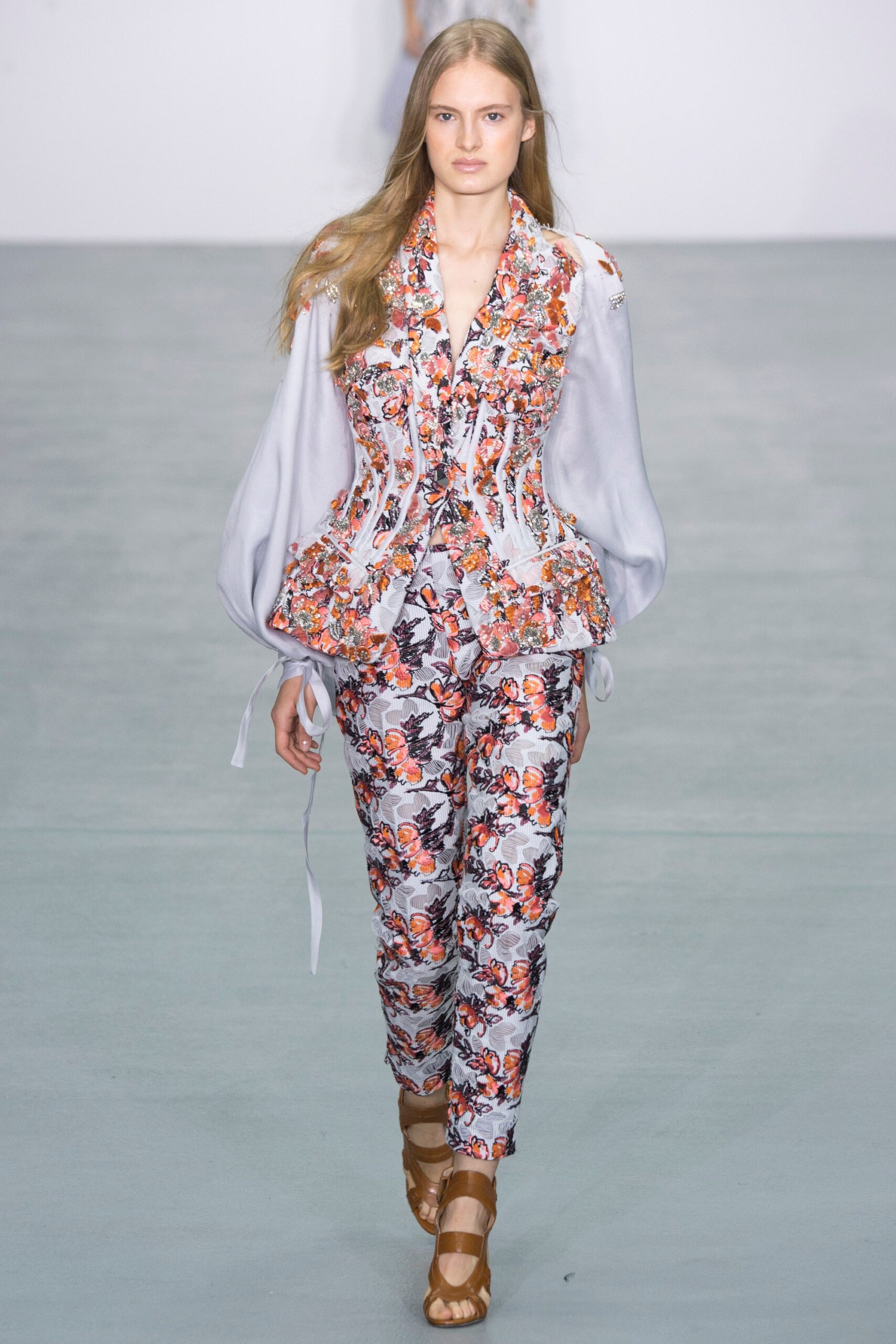 embroidered white blouse with printed pants