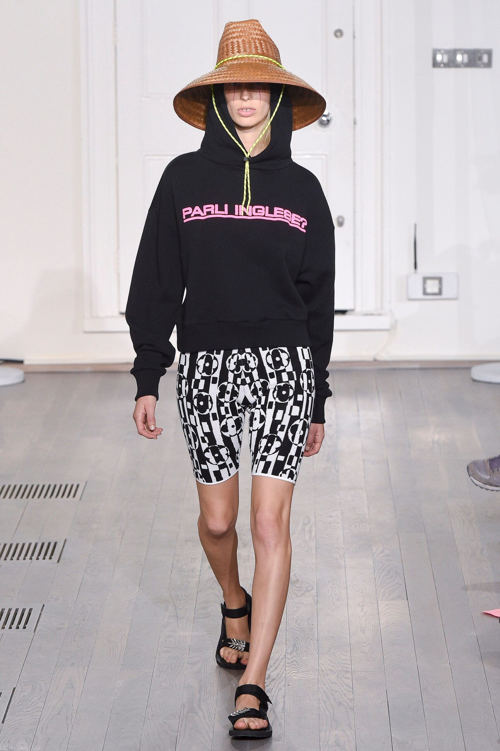 black hoodie with printed shorts