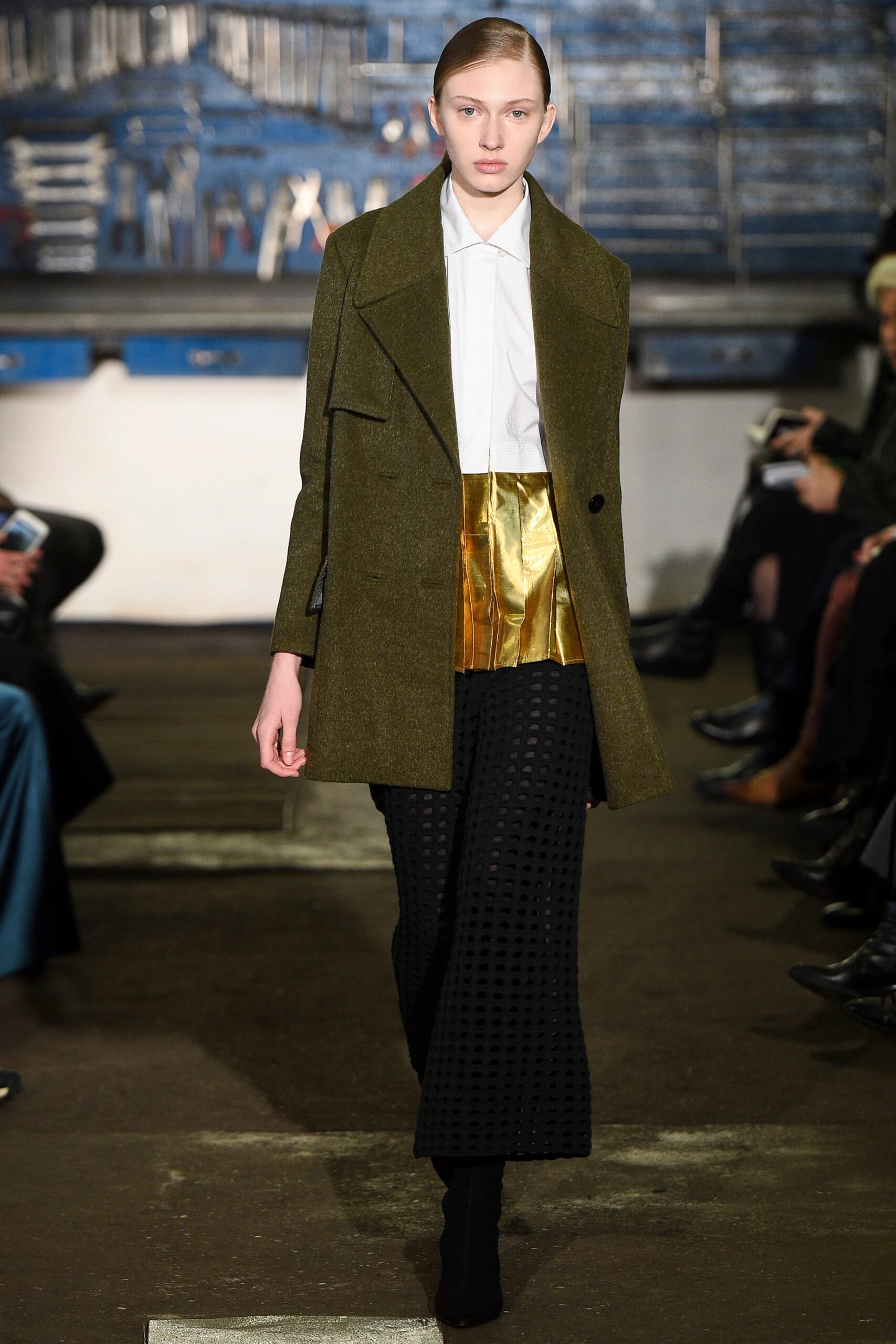 olive coat white blouse gold skirt