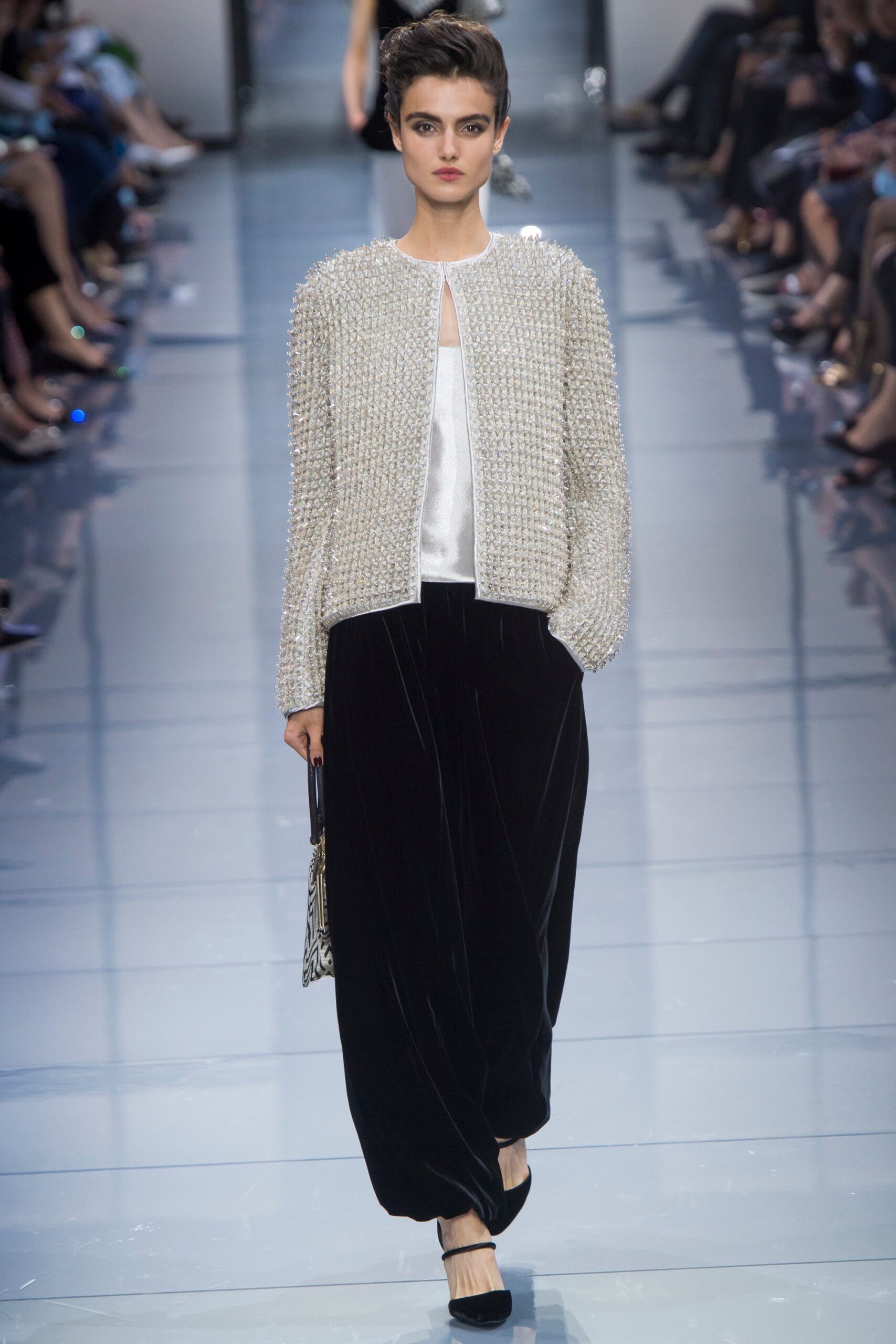 white relaxed jacket with black velvet pants