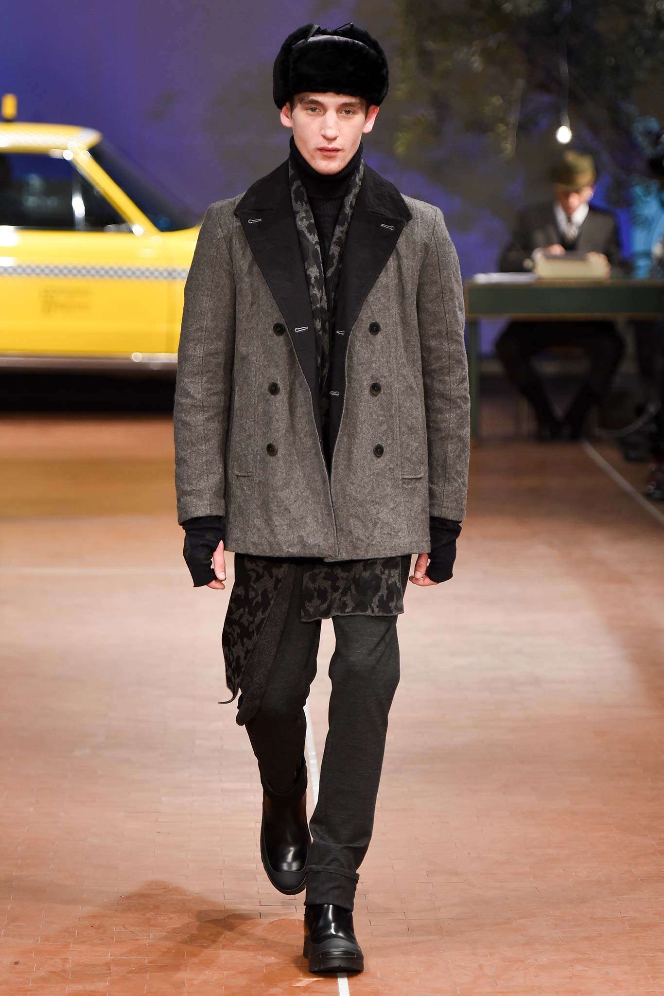 gray tailored coat with black scarf
