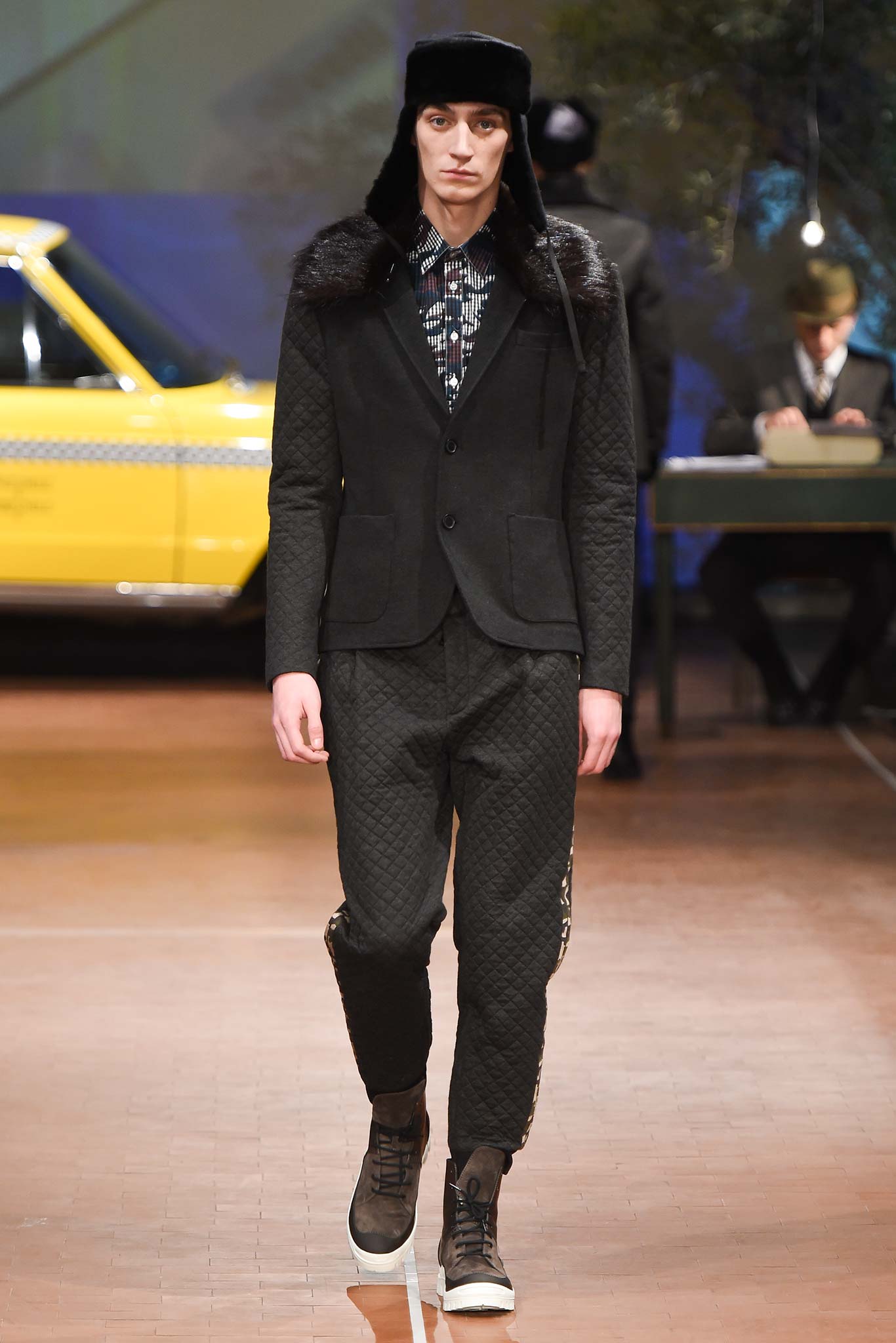 black tailored suit with quilted details