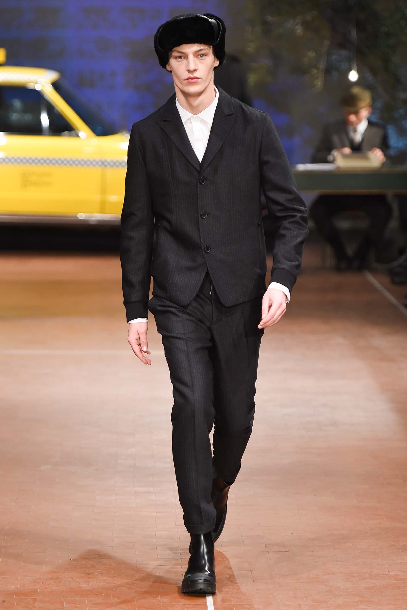 black tailored suit with white shirt